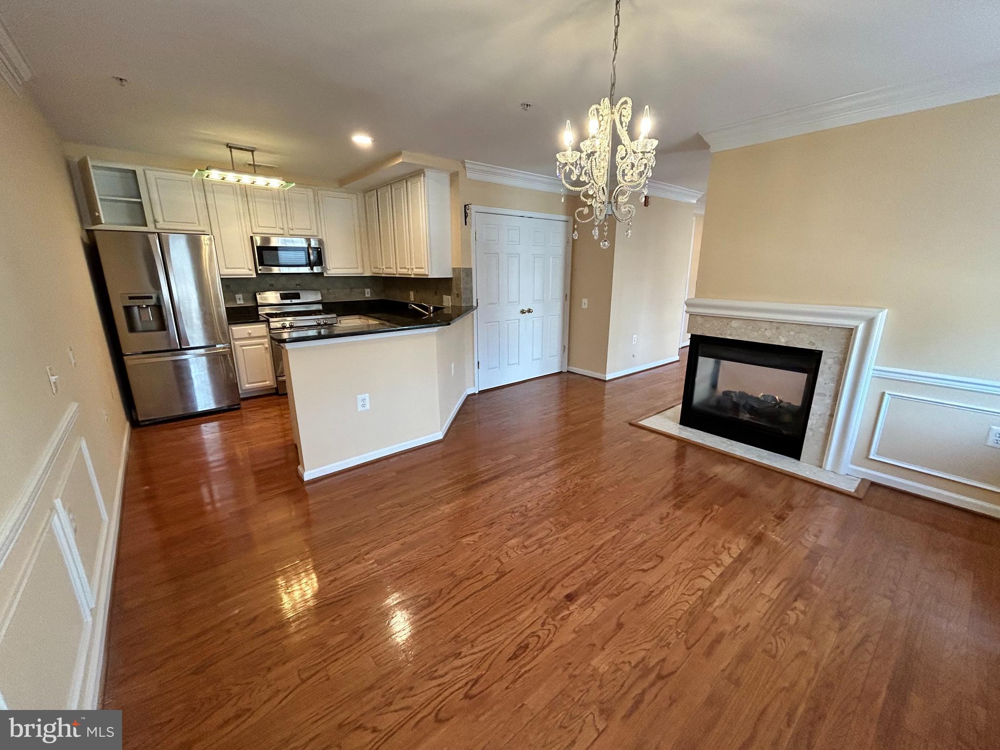 Available immediately! Well-kept 2-bedroom, 2.5-bath condo in the heart of Old Town Alexandria, located in the sought-after Old Town Village, just a short walk to King Street Metro, Whole Foods, shops, and dining. Both bedrooms feature en suite bathrooms, offering privacy and convenience in this spacious unit. The main level features a well-appointed kitchen with stainless steel appliances, a gas fireplace in the living room, a balcony, and an in-unit laundry room with extra storage, making this unit both functional and comfortable for everyday living. Community amenities include a pool, fitness center, clubhouse, and an elevator building for easy access in a secure, beautifully maintained community. Household income must be $135,000+/year with good credit and rental history. No smokers; $50 application fee per tenant and move-in/elevator fee apply. Tenant pays gas, electric, and cable/internet. Minimum 9 month lease ready for immediate move in.