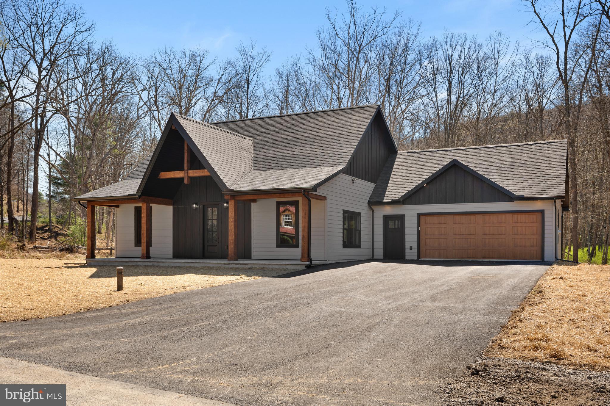 Welcome to 9062 Murray Run Road, Huntingdon, PA — a rare custom-built new construction home on 1.2 acres for under $400,000.

Step inside to a beautifully crafted interior featuring a poplar ceiling, exposed red oak timber frame, and durable LVP flooring throughout. The kitchen offers hickory cabinetry, custom-built finishes, and a spacious walk-in pantry with a sliding barn door.

The home includes 2 bedrooms, highlighted by a private primary suite with creek views, walk-in closet, and a custom river rock shower.

Additional features:

Anderson windows & doors (high efficiency)
High-efficiency HVAC with propane backup
Oversized garage with water hookups & drain
Dedicated laundry area with utility sink

Enjoy the outdoors on your 1.2-acre lot with a private creek running through the backyard, just minutes from Raystown Lake.

Perfect as a primary home, weekend getaway, or short-term rental investment — new construction, land, and location all in one.