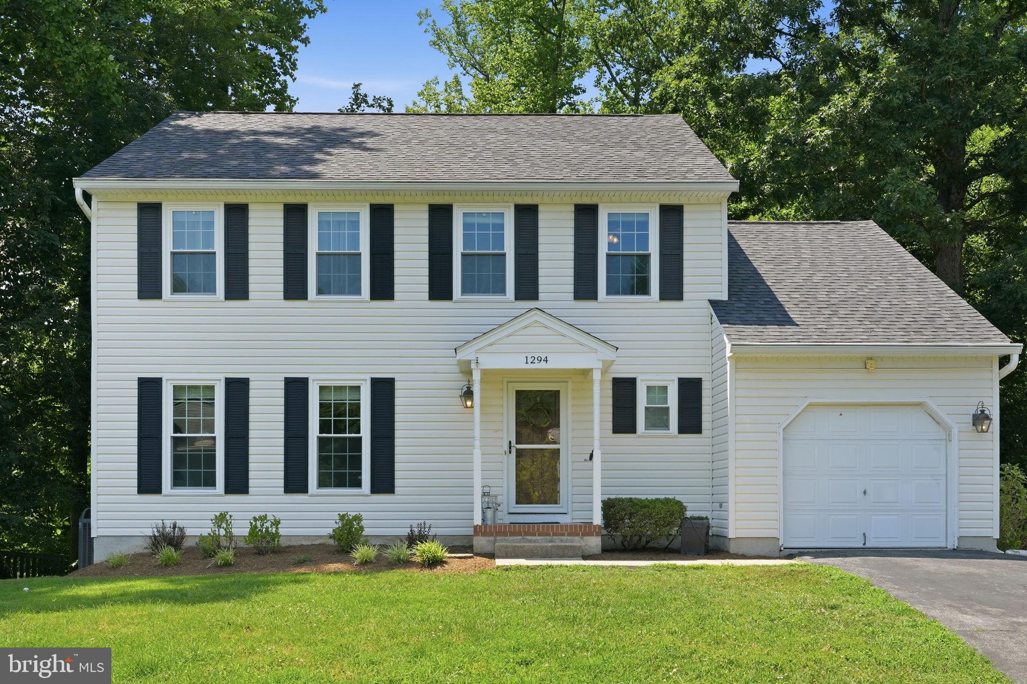 Perfectly positioned on a quiet cul-de-sac in the highly sought-after Arnold community of Foxmoor, this beautifully maintained colonial offers the ideal combination of privacy, space, and everyday convenience. Backing to a peaceful wooded setting and situated on a fully fenced lot, the backyard provides a serene retreat with plenty of room for entertaining, play, or simply enjoying nature. Inside, you'll immediately appreciate the fresh, move-in-ready feel with the entire interior recently painted and brand-new carpet throughout. The thoughtfully designed floor plan features an inviting open flow between the kitchen and the soaring two-story family room, where vaulted ceilings create an impressive sense of space while maintaining a warm and welcoming atmosphere. Whether hosting family gatherings or enjoying a quiet evening at home, this layout is perfectly suited for today's lifestyle. Upstairs, the spacious primary suite is a true retreat, highlighted by an oversized walk-in closet and an updated primary bathroom featuring a standalone shower and separate tub/shower combo. Generously sized secondary bedrooms provide comfortable accommodations for family or guests. The finished lower level adds exceptional versatility with a fourth bedroom and a third full bathroom, making it an ideal space for overnight guests, an in-law suite, home office, or recreation area. Outdoor living is equally impressive with an expansive deck overlooking the private backyard, seamlessly connecting to the lower patio to create multiple spaces for relaxing and entertaining. As an added bonus, you'll enjoy easy access to the newly completed College Parkway walking and bike trail, offering miles of scenic recreation just moments from your front door. Rarely does a home combine this level of comfort, privacy, updates, and location in one of Arnold's most desirable communities. Don't miss the opportunity to make this Broadneck Peninsula gem your next home.