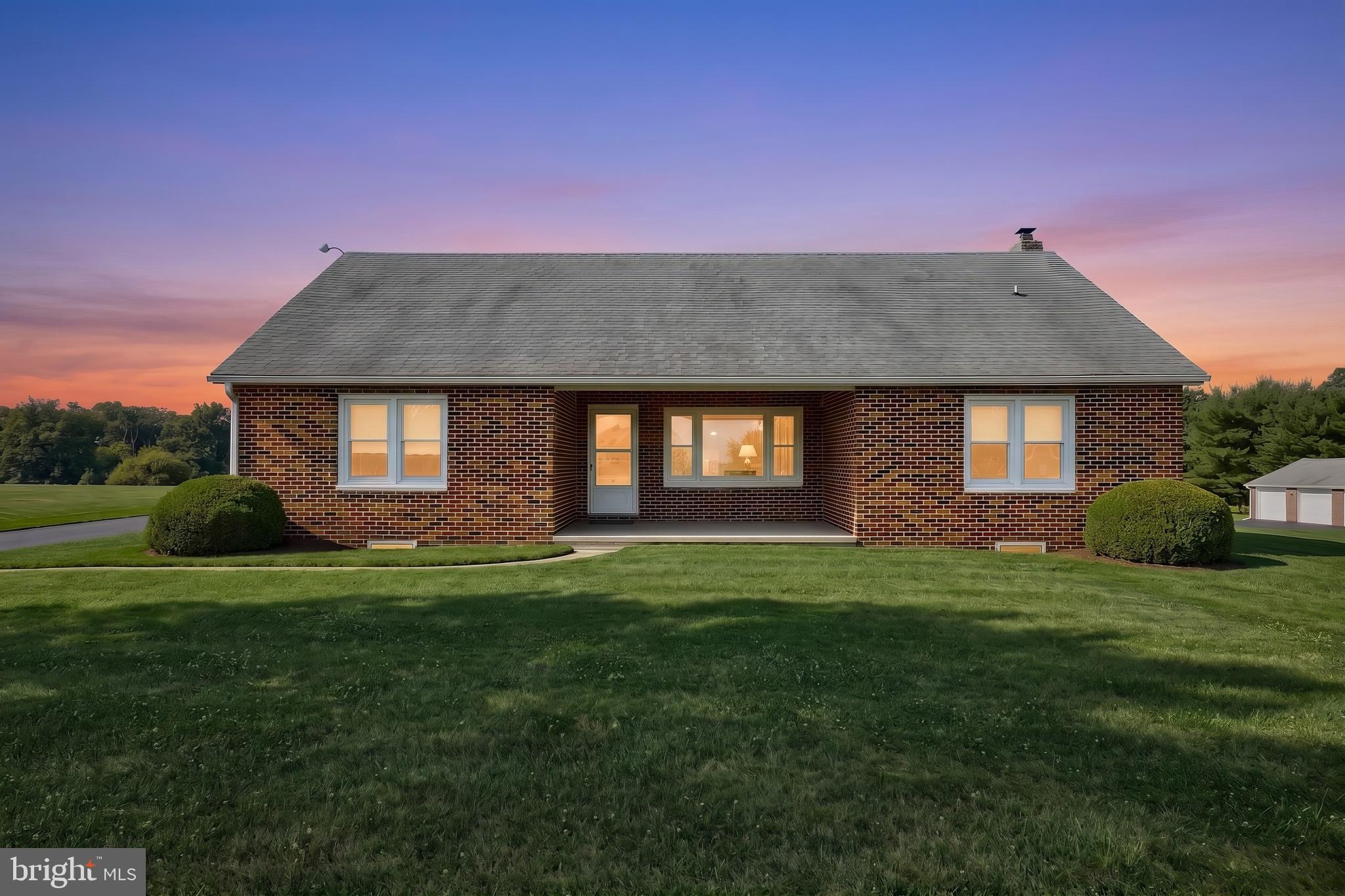 Welcome to this very well built all brick, charming country property nestled on  1.25 acres in Hopewell Township. Offering the perfect blend of rural tranquility and commuter convenience, this spacious 2-bedroom home nestled on 1.25 acres, provides plenty of room for family and guests. Conveniently located just minutes from I-83, this home offers an easy commute to both York and the Maryland line while maintaining the privacy and serenity of country living. Enjoy the peaceful setting with open views and room to relax, garden, or entertain outdoors. . Whether you're looking for extra space, a large level yard, or the opportunity to make this home your own, this property is full of potential. From the dining/bonus room you will find a finished staircase leading to an upper level that is finished with hardwood. This vast space can be fitted out to add additional bedrooms and/or a full bath, with plenty of ceiling height! Enjoy the convenience of a paved driveway with lots of parking area and a detached 2-car garage. Schedule your private showing today and discover everything this New Freedom property has to offer. 

** Included in this sale is the .36 acre parcel to the left of the property,( tax ID: 32-000-BJ-0053-A0-00000) for a combined acreage of 1.61 acres.