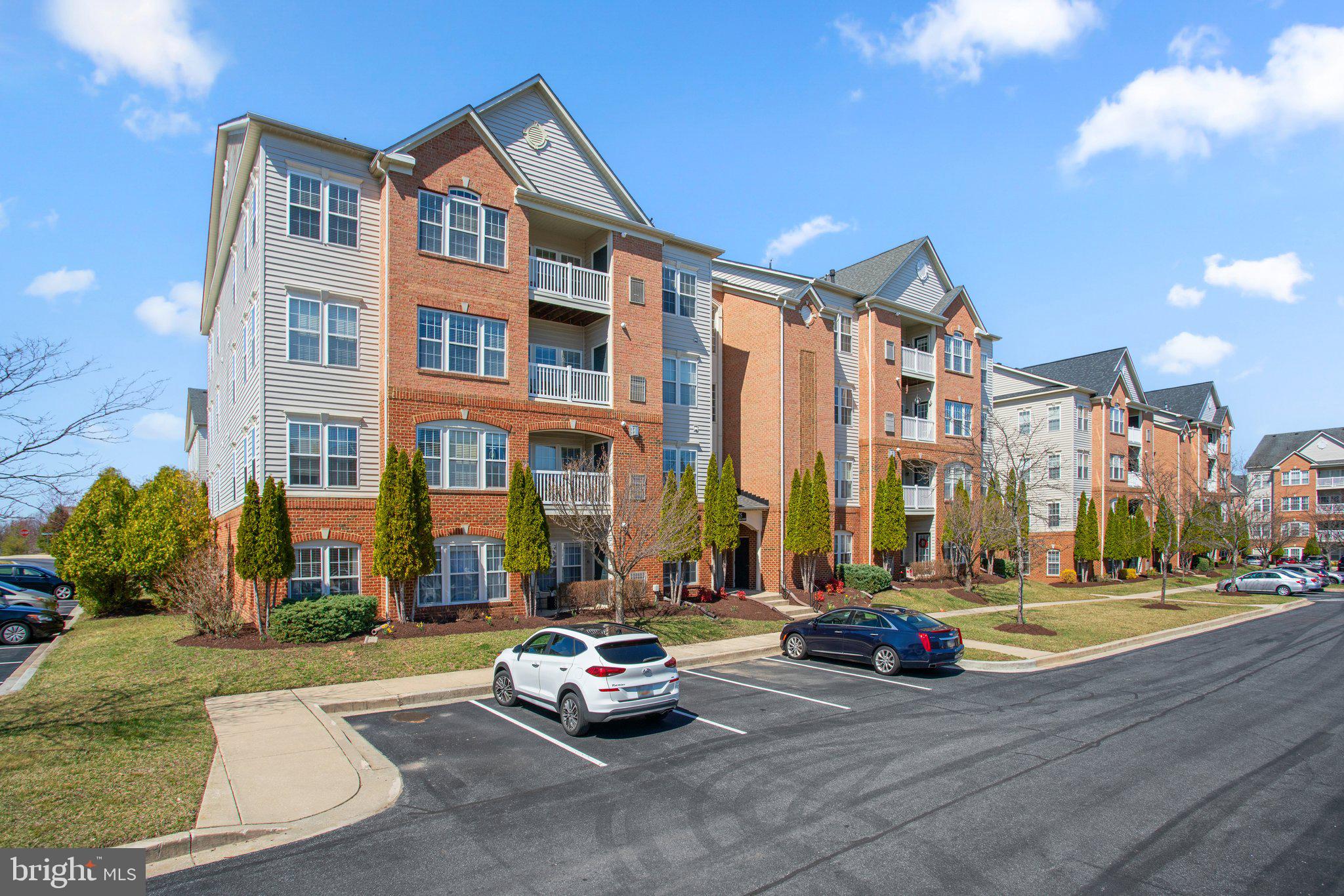 Discover the perfect blend of comfort and convenience in this beautifully updated 2-bedroom, 2-bathroom condo in the sought-after 55+ community of Hearthstone at Village Crest, located in Taylor Village. Situated on the main level, this home offers effortless living with no stairs and easy access to all the wonderful amenities this neighborhood has to offer.
The open-concept living and dining area features gleaming hardwood floors and elegant crown molding, creating a welcoming space for both everyday living and entertaining. Large windows allow for plenty of natural light, enhancing the warm and inviting atmosphere. The kitchen is equipped with stainless steel appliances (dishwasher and range are brand new!), Corian countertops, and ample cabinet space, along with a pantry for extra storage. Whether you enjoy preparing meals or simply need a functional space to cook, this kitchen provides everything you need.
The two generously sized bedrooms offer privacy and comfort, each with brand-new carpeting. The primary suite includes a huge closet and an en-suite bathroom, while the second bedroom is perfect for guests, a home office, or additional flex space. A second full bathroom ensures convenience for both residents and visitors alike.
Living in Hearthstone at Village Crest means enjoying a maintenance-free lifestyle with fantastic community amenities, including a senior center and clubhouse, both covered by the association fees. Take advantage of the indoor and outdoor pools, tennis court, and tot lot, or take a short drive to explore the charming shops and restaurants of historic Old Ellicott City. Shopping, dining, and everyday essentials are just minutes away, making this an ideal location.
If you’re looking for a move-in-ready home in a vibrant 55+ community, this is the one for you! Schedule a showing today and experience the comfort and convenience of this wonderful home.