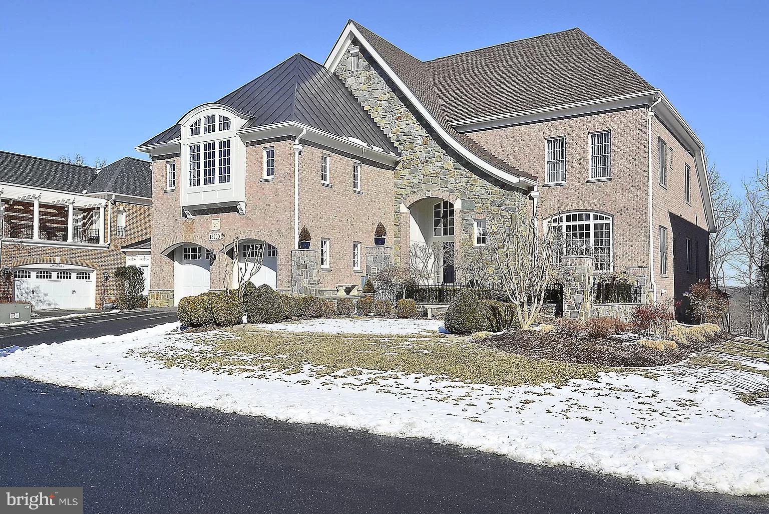 Step into a realm of classic elegance and timeless design, where neutral color palettes defy passing trends seen on the latest HGTV series. This exquisite property, nestled within the coveted River Creek Country Club in Leesburg, Loudoun County VA, boasts the McArthur model by Mitchell and Best Custom Builders. Situated on one of just 31 lots offering Potomac River water views and scenic fairways of the River Creek Golf course, this home epitomizes exclusivity in a secure community. Only 31 single-family Potomac Water view homes exist, with just one hitting the market and swiftly finding a new owner in the past year.

Set in a secure gated community and on a private cul-de-sac, this residence stands out as one of the few single-family water-view homes featuring a main floor owner's suite. Over the last 8 years, meticulous maintenance and close to $400k in remodeling upgrades, including a new roof, HVAC, and kitchen, have elevated this home to surpass the standards of new construction.

Perfect for both work-from-home functionality and entertaining, the outdoor space steals the show with breathtaking views from all three levels. The manicured rear garden, complemented by a new maintenance-free composite deck, becomes the favored hangout and dining spot—a tranquil haven where you can savor your morning coffee or evening wine.

Step into the front garden, adorned with a Versailles vignette, a fountain, and ample seating—an inviting space to engage with neighbors on leisurely strolls.

Indoors, the home seamlessly combines open and spacious rooms with cozy corners, showcasing high ceilings, balconies, and hardwoods throughout. The main level office/library with custom built-ins provides an ideal workspace, while the owner's suite, boasting a new fireplace, double walk-ins, and water views, exudes sheer opulence.

Venture to the lower level with walkouts onto a new patio, transforming into your personal event space with a private bar, fireplace, and gaming areas. Abundant storage spaces and a versatile finished flex space over the garage further enhance the home's appeal.

Discover the rich history of the River Creek Community, an exclusive enclave just 20 minutes from IAD and close to the DC metro in Ashburn. Premium shopping, cultural attractions, and diverse dining options are within easy reach.

Embrace a lifestyle where world travels, cultural experiences, and serene countryside living converge in this unique and unmatched residence. Tee up on the Potomac at Leesburg's premier golf experience, featuring an 18-hole championship course designed by Ault-Clark. River Creek's comprehensive golf program, complete with an in-house Golf Academy and Fitting Area, nationally recognized professionals, and a vibrant calendar of tournaments and events, positions it as one of the most valuable golf memberships in Northern Virginia.

Belong to the River Creek Club—a home away from home that cultivates a relaxed, resort atmosphere, emphasizing outstanding service and amenities. This is not just a residence; it's a destination—a haven where luxury living seamlessly blends with the perfect blend of sophistication and leisure.