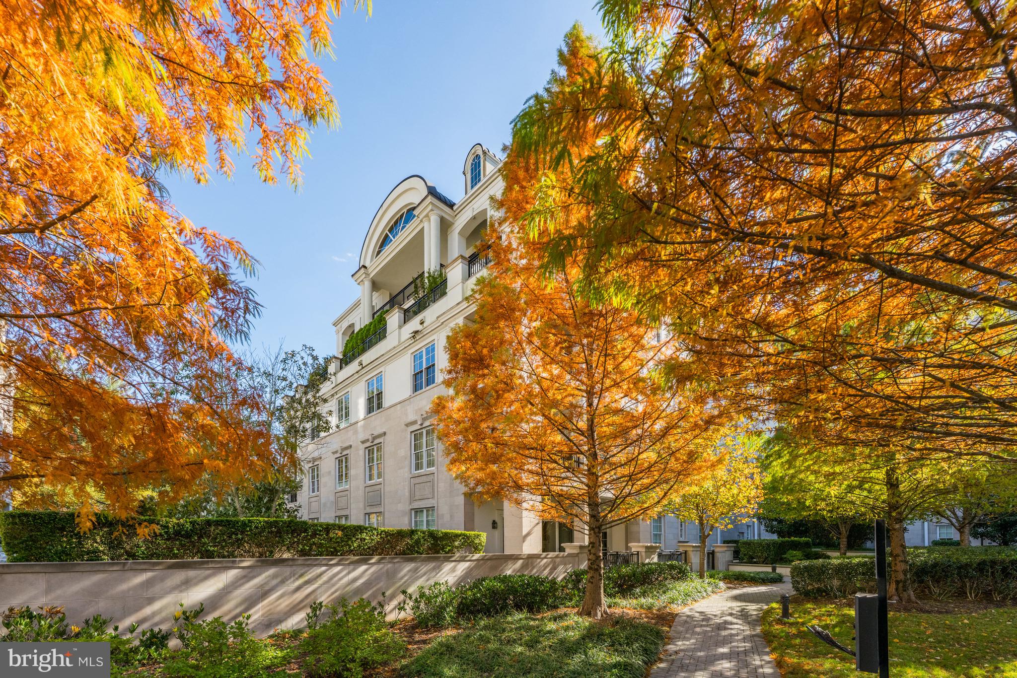 A once in a lifetime opportunity to own this stunning and rarely available Quarry Springs main level luxury true 3 bedroom condominium with three landscaped terraces surrounded by the gardens of the property.  
This residence lives as if it were a one story home with artfully crafted room sizes and an exciting floorplan.
The captivating room sizes are expanded by the outdoor living spaces seen from almost every room.  Top of the line finishes and mouldings, along with top of the line appliances are the hallmarks of this very special residence.   The entry foyer has a gallery feel with more than ample space for artwork.  A welcoming living room with fireplace opens to the full size dining room, The spacious  gourmet kitchen, flooded with light will delight you  with marble countertops, and an oversized marble island that is adjacent to an expansive family room opening to one of the 3 terraces.   The primary suite with spacious bath and more than ample closet space opens to its own terrace.  Two additional bedrooms and a shared bath along with an elegant powder room and separate laundry room complete the main level.
Quarry Springs is a private gated luxury community with clubhouse, pool and 24 hour security at the gatehouse and a 24 hour concierge in the lobby of the building.  Luxury living at its finest in a secure gated community.  Two car assigned garage parking is included with the residence and has elevator access to the lobby of the building.  Approximately 25 minutes to Dulles and Reagan airports, and the White House.

 All the benefits of luxury living with a minimum of maintenance.  Hurry this home is special!