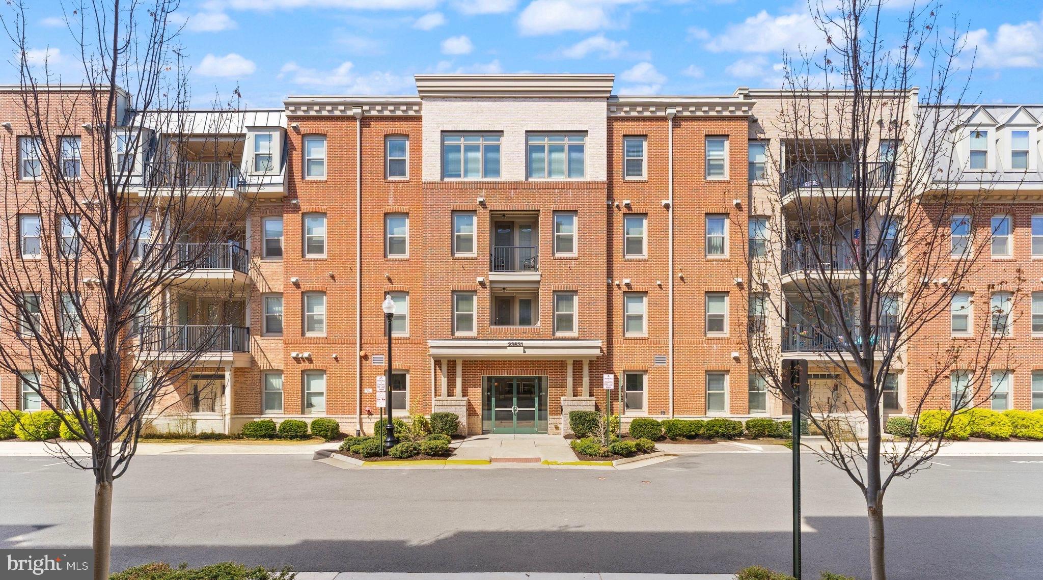 Welcome to this beautifully refreshed top-floor condo in the sought-after 55+ Birchwood at Brambleton community that is indivudally ANSI compliant(it has larger than normal halls and doors, grab bars in both bathrooms and the walk-in shower, a kitchen countertop that has a space left for wheelchairs to slide into when working at the stove and has a fire alarm notification that is both visual and auditory.) 
This light-filled home features fresh paint throughout, brand new carpet, beautiful wood flooring, and stainless steel appliances. The oversized kitchen island is perfect for entertaining, offering both style and functionality, while ample storage space ensures everything has its place.Enjoy peaceful mornings or relaxing evenings on your private balcony, all from an ideal top-floor location with an attached garage for added convenience. Experience low-maintenance living with resort-style amenities in one of Brambleton’s most desirable active adult communities. Come and see this beautiful home today!