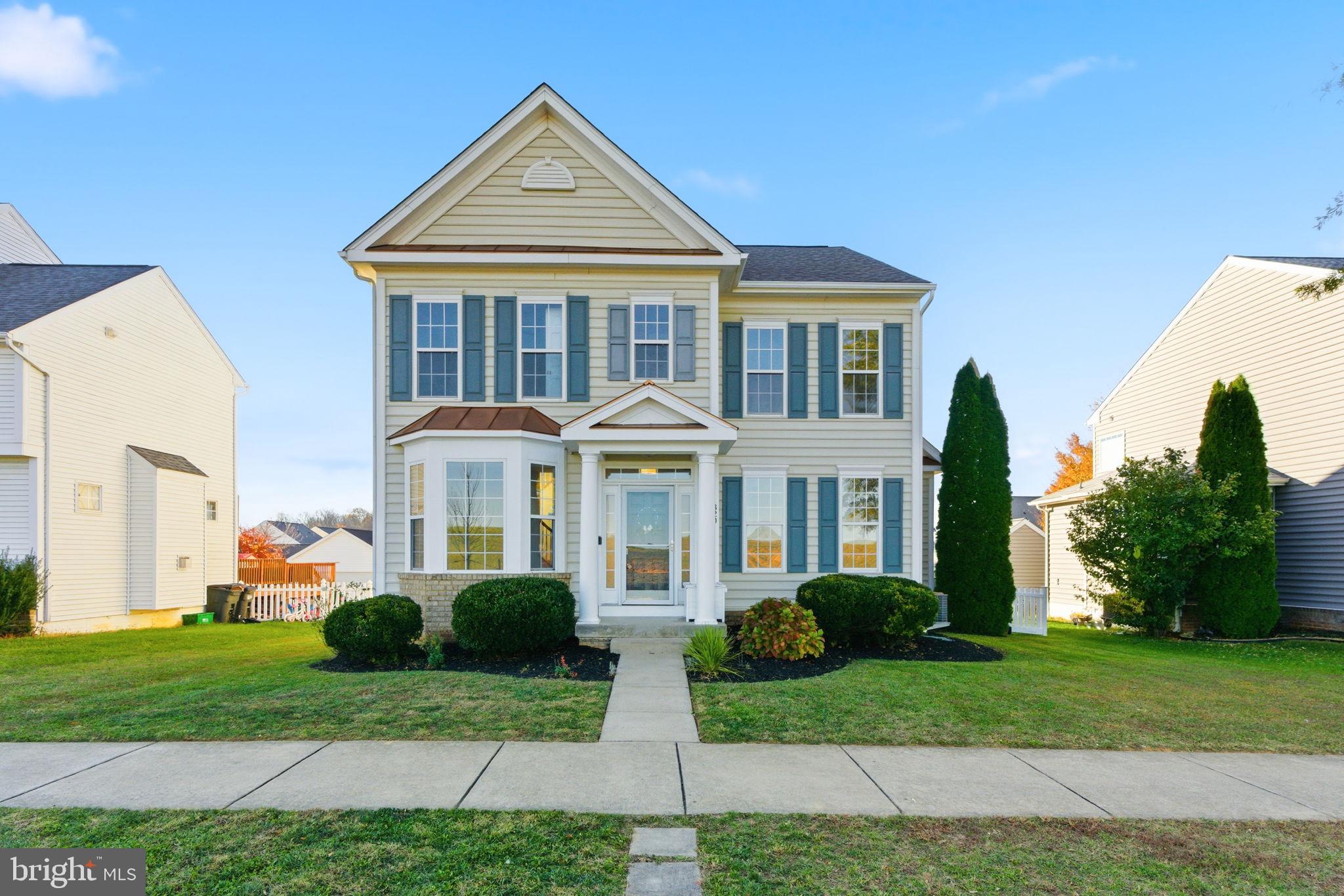 Nestled in the sought-after Huntfield community, this beautifully renovated Colonial-style home offers a perfect blend of modern comfort and timeless elegance. With over 4,000 square feet of finished living space, this residence features four spacious bedrooms and three-and-a-half baths, including a fully finished basement with a full bath and kitchenette.

The main level welcomes you with rich hardwood flooring and an open, flowing layout that connects the living, dining, and kitchen areas seamlessly. The chef’s kitchen is a true standout, featuring a large center island, stunning white cabinetry, and abundant counter space for meal prep and entertaining. The design perfectly balances beauty and function, ideal for both casual family meals and hosting guests. A cozy gas fireplace anchors the living room, creating a warm and inviting space to relax.

Upstairs, the primary suite provides a private retreat with an ensuite bath and walk-in closet. The additional bedrooms are bright and spacious, with stylish accent walls in the second and third bedrooms adding a touch of modern design.

The fully finished lower level expands your living options, featuring a full bath and kitchenette, perfect for guests, a media space, or multi-generational living.

Outside, enjoy the community’s tree-lined streets, sidewalks, and amenities including a pool (currently being built) and beautifully maintained common areas. The rear-entry detached two-car garage and convenient on-street parking add to the home’s charm and functionality.

This is more than just a home; it’s a thoughtfully updated, move-in ready property offering space, comfort, and a true sense of community in one of the area’s most desirable neighborhoods.
