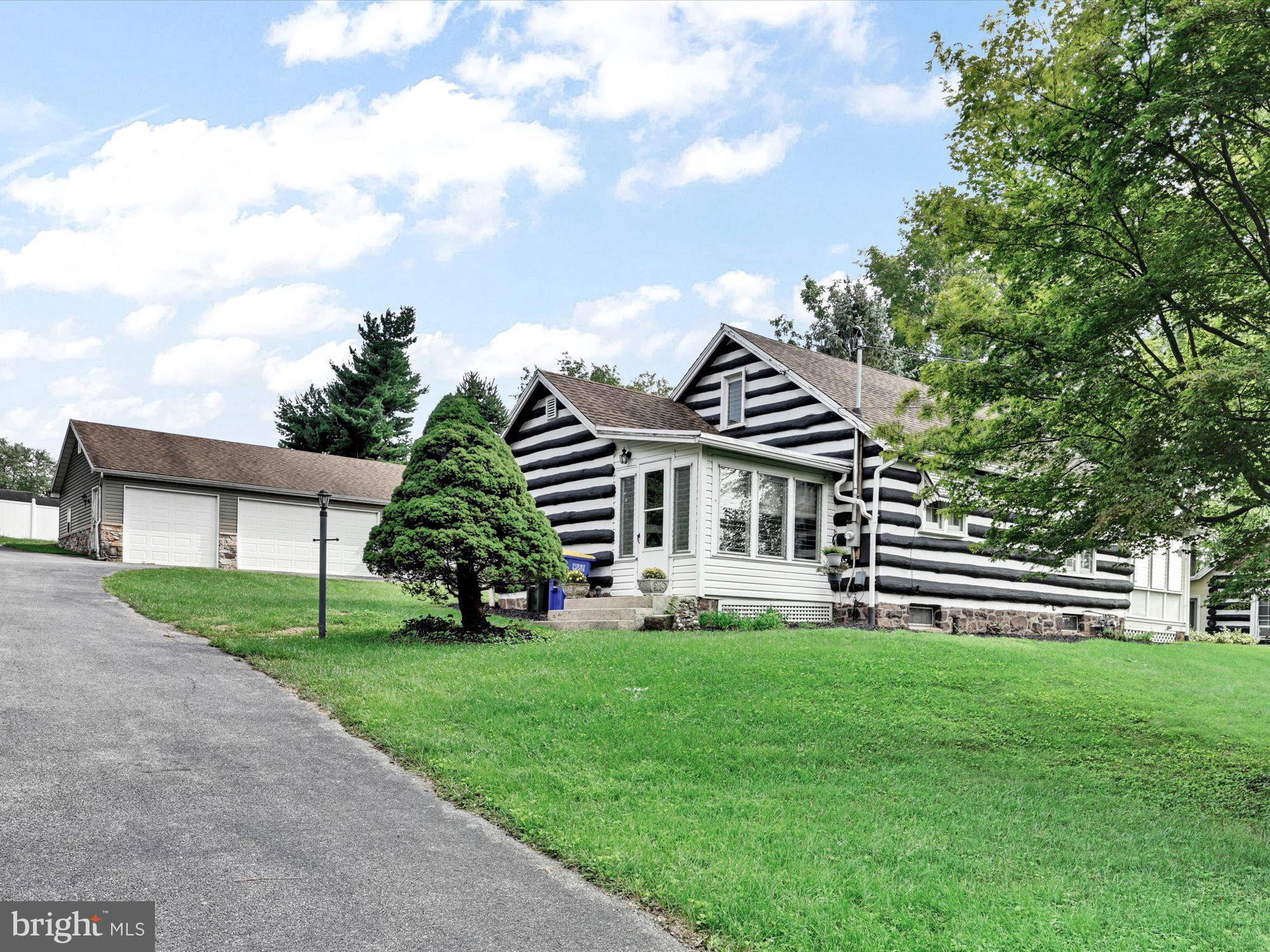 This 4 BR, 1  &  3/4 BA home in West York Schools has a lot to offer. The main floor has a large living room with a beautiful brick fireplace, separate dining room. The main floor also features 2 BR and full BA. The 2 enclosed porches provide a lot of extra living space. Upstairs are 2 additional BR.  This property has a huge oversized detached garage/workshop for all your storage/hobby needs. This property also has a studio with a full bath and kitchenette attached to the garage.  This unique home is waiting for your special touch to make it your own. You do not want to miss this opportunity. Schedule your showing today!