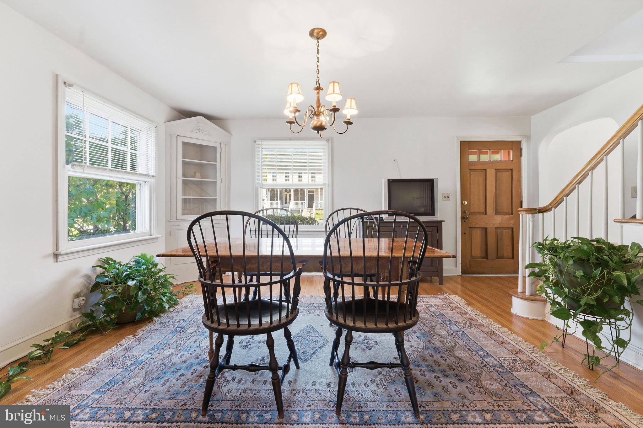 Stately Brick Colonial with Expansive Lot & Unique Opportunity

Come discover the charm and potential of this solid brick Colonial, ideally set back from the road in the quaint village of Springtown. Offering both residential comfort and village commercial zoning, this property presents a rare opportunity for flexible use. low county taxes; minutes to neighboring Northampton & Lehigh counties; close proximity to Lehigh University as well as LVHN & St. Luke's facilities; hop/skip/jump from Rte 78, NJ & NY.

The home welcomes you with abundant natural light and beautiful hardwood floors throughout. The main level features a spacious living room with a classic fireplace and mantle, a formal dining room, a kitchen, and a convenient powder room—perfect for everyday living and entertaining.

Upstairs, you’ll find four generously sized bedrooms and a full bath, all with continued hardwood flooring. A walk-up attic with a cedar-lined closet provides excellent storage and potential for additional living space.

The walkout basement offers even more versatility, along with direct access to the attached one-car garage.  heated garage adds further functionality—ideal for hobbyists, contractors, or extra storage.

Step outside to enjoy the expansive lot, highlighted by a gorgeous stone patio with built-in fireplace, perfect for relaxing or entertaining. Stone retaining walls add character and structure to the outdoor space, while ample off-street parking provides convenience for guests or business use.

As an added bonus, the sale includes an additional lot (Tax ID: 42-015-005)