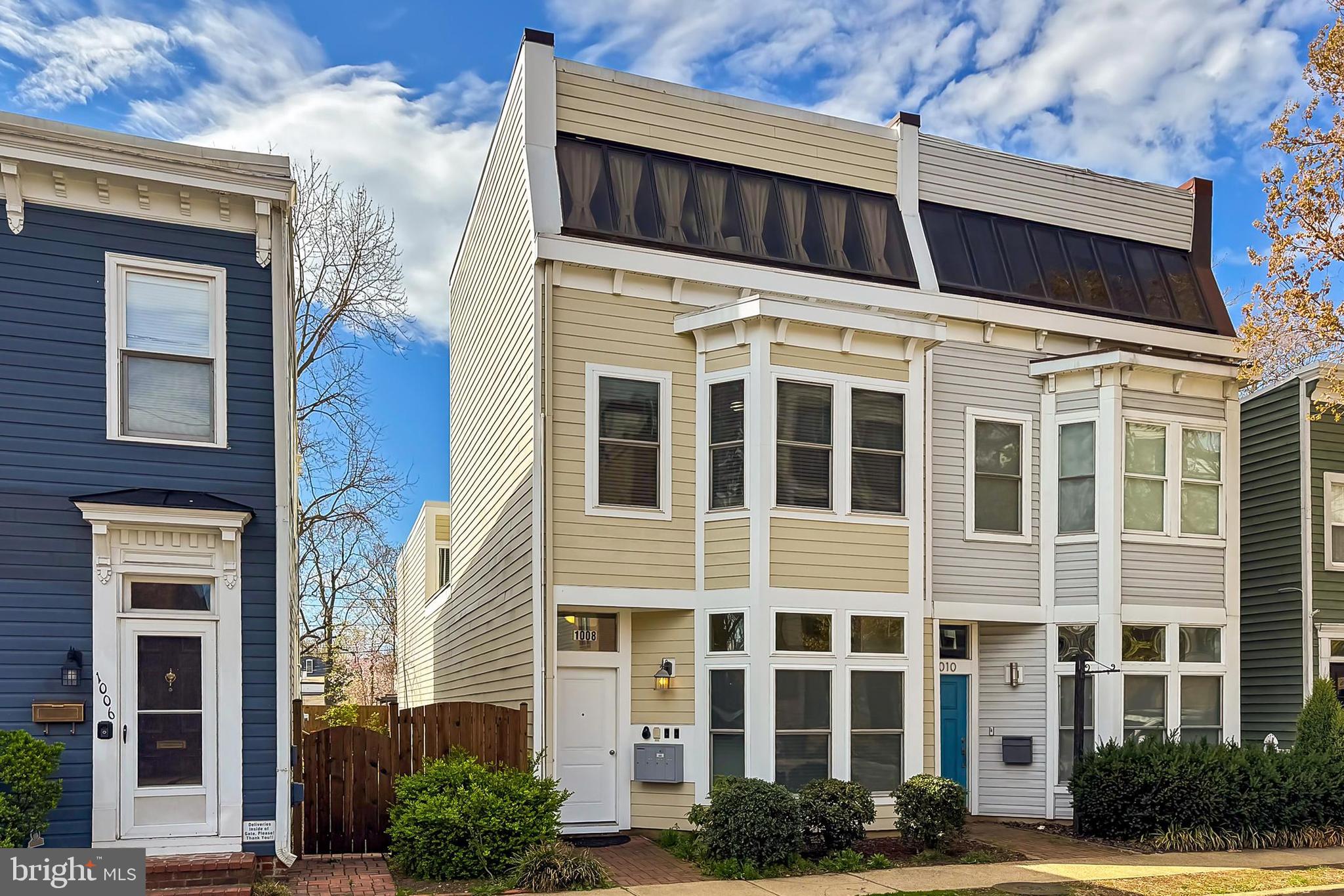 Looking for a modern home with off-street parking where you can live and earn extra rental income as well? You've found it! Welcome to 1008 Pendleton Street, centrally located in historic Old Town, Alexandria. This bright, modern 3-story townhome was completely renovated starting in 2018 to create the unique opportunity to own a 3,176 square foot multi-use building currently boasting a first floor commercial space (could possibly be converted to residential space) as well as two large upper level residential apartments, separately metered for electricity, with 4 car rear off-street parking spaces.  Perfect opportunity for live/work scenario - live in one unit and lease the other 2 for extra income! Everything has been done including new exterior hardiplank siding, new windows, new kitchens and bathrooms  (2018-2019) as well as a new roof (2020), a fresh exterior paint job and new independently controlled mini-split HVAC systems (2022-2023). Unit 1A is currently a main floor office space with a large reception/conference area, two private offices, ample storage, kitchenette and ADA bathroom.  #2B is a second floor, two level, one bedroom + one full bath residential unit with a wall of windows, in unit laundry and individually controlled HVAC.  #2C is a second floor, one bedroom + one bath residential unit with soaring 2-story ceilings and laundry.  Each unit has its own hot water heater.  Flanked by N. Henry and N. Patrick Streets (Route 1 South and North) as well as close by George Washington Parkway and both the King Street and Braddock Road Metro Stations--make commuting to nearby Reagan National, The Pentagon, Washington DC to the North and Fort Belvoir to the South, a breeze.  Do not miss out to make this fully leased, turn-key and versatile property your own.