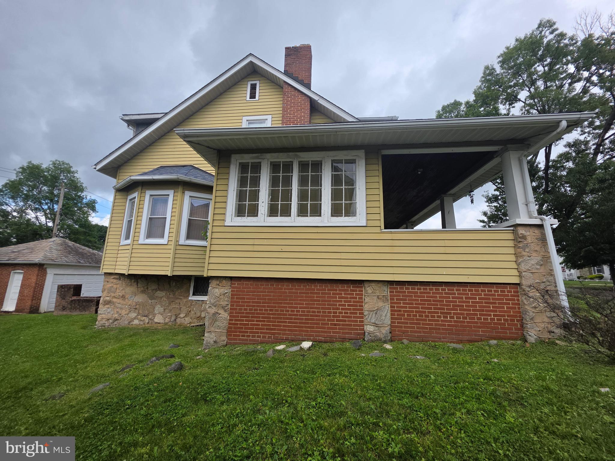 Investor Special | Renovation Opportunity. Unlock the potential of this charming property located in the  Ashburton community. Featuring classic architectural details and generous living spaces. Property features include separate Living Room and formal Dining Room, Den/Office, spacious eat-in Kitchen with built-in refrigerator, wood-burning Fireplace. 3 bedrooms, 1 full bath, 2 half baths. The primary suite has an enclosed balcony with private access. The property requires moderate renovations and remodeling throughout.  This home offers an excellent opportunity for investors, renovators, or buyers looking to create their dream home. Sold in As-Is condition.  Price reflects the property condition.  Seller will consider all reasonable offers.