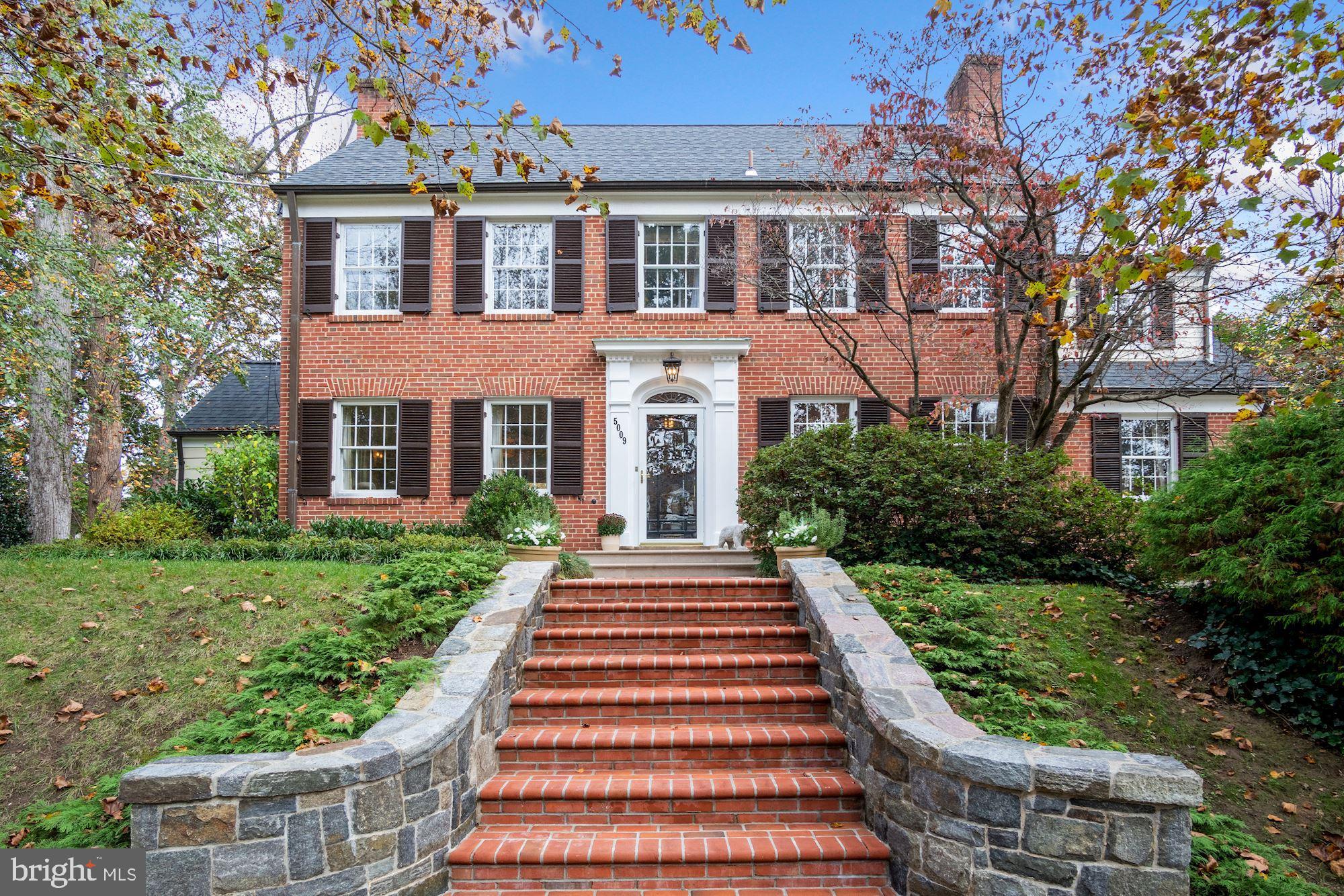 OPEN HOUSE CANCELED - UNDER CONTRACT! Beautifully expanded and renovated by the current owner, this elegant colonial with wonderful curb appeal has approximately 5,700 square feet of finished living space. Among other things, the phenomenal addition has created an amazing top of the line gourmet kitchen with beamed ceilings, walls of windows overlooking the gorgeous grounds, and an extra large island, a stunning primary bedroom suite including two separate bathrooms, two walk-in closets, sitting room and laundry, a fabulous, large two-story screened porch off the kitchen with stone fireplace, two additional garage spaces (for a total of THREE garage spaces), a lower level office with fireplace (for a total of SIX fireplaces) and walls of windows and French doors opening to the yard and more. The main level also includes formal living and dining rooms, office with separate entrance, family room with fireplace, butler's pantry and two powder rooms. Four bedrooms and four full baths are found on the second level, and an additional two bedrooms and bath are on the third level. The lower level includes a spacious recreation room with fireplace and walkout, game area, second laundry room, access to the three garage spaces, large office with walkout and fireplace, full bath, wine closet and more. The lot size is almost 1/4 of an acre and beautifully landscaped, featuring two large flagstone patios with stone wall surround, ideal for large or small scale entertaining, and ample play area. This property is an absolute WOW and one you should not miss!