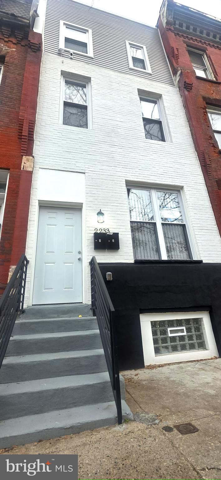 Welcome to 2233 N. 16th St, a fully renovated legal duplex positioned in a rapidly developing corridor surrounded by new construction—an immediate indicator of continued value appreciation and long-term upside.

This turnkey asset has been thoughtfully upgraded with new electrical, plumbing, and energy-efficient mini split systems for both heating and cooling. Each unit showcases modern finishes including shaker cabinetry, quartz countertops, and well-designed layouts that appeal to today’s tenants and owner-occupants alike.

Whether you are an investor seeking consistent cash flow, a landlord expanding your portfolio, or a buyer looking to offset your mortgage by living in one unit while renting the other, this property offers multiple strategic paths to wealth creation.

Unit 1 is a spacious bi-level layout offering 3 bedrooms and 3 full bathrooms, with exclusive access to the basement and rear yard. The basement provides additional storage and includes a dedicated laundry area for this unit. The layout is flexible—given the configuration, it can function as either a 3-bedroom unit or a 2-bedroom with a more traditional living room setup, allowing you to tailor the space to market demand.

Unit 2 spans the 2nd and 3rd floors and features 3 bedrooms and 3 full bathrooms. Upon entry, you are greeted by a modern kitchen outfitted with quartz countertops, shaker cabinetry, and a conveniently located laundry closet with washer and dryer. The layout flows seamlessly into the living area, with a bedroom and full bathroom on the main level. The upper level offers two additional bedrooms, each complemented by its own bathroom, providing privacy and convenience.

With strong rental potential, modern systems, and a location surrounded by active development, 2233 N. 16th St is positioned to produce income for decades to come. Opportunities like this—combining condition, location, and versatility—are limited.

Properties like this generate serious interest—position yourself to capitalize and bring your strongest offer forward before it’s gone.