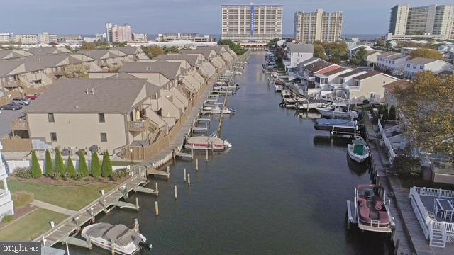 Why plan your vacation every year when you can own your own week (#35) at Club Ocean Villas II, Unit # 224.! This is a prime summer week! In 2026 the dates are Sept 08/28-09/04.  Always Fri to Fri. In 2026 Labor Day is Sept 7th.  2 bedrooms both with private in suite full baths, fully stocked kitchen, washer and dryer, dining table and living room with a sleeper couch, Unit sleeps 6.  You also get your very own fenced in courtyard patio area with your very own hot tub!! Everything is included, all utilities, linens, towels, paper products etc. You just pay the one small yearly fee each year and that's it!  You get a prime vacation week at the beach every year!! Not only are you close to the beach and bay, but this vibrant community offers plenty of amenities including outdoor pool, heated Indoor pool, exercise room & sauna, pickleball & tennis courts, basketball, as well as in close proximity to Northside Park, plenty of restaurants, shopping and groceries. For your convenience linens and towels are provided as well as free wi-fi and free parking. Deeded and can be yours for your enjoyment or you have the option to let friends and family rent it or join trading company to travel to other locations.!! Week is always #35 and Fri-Fri (actual dates vary each year). If by chance you can't use it, one year you can let your family use it or rent it. Call for all the details.