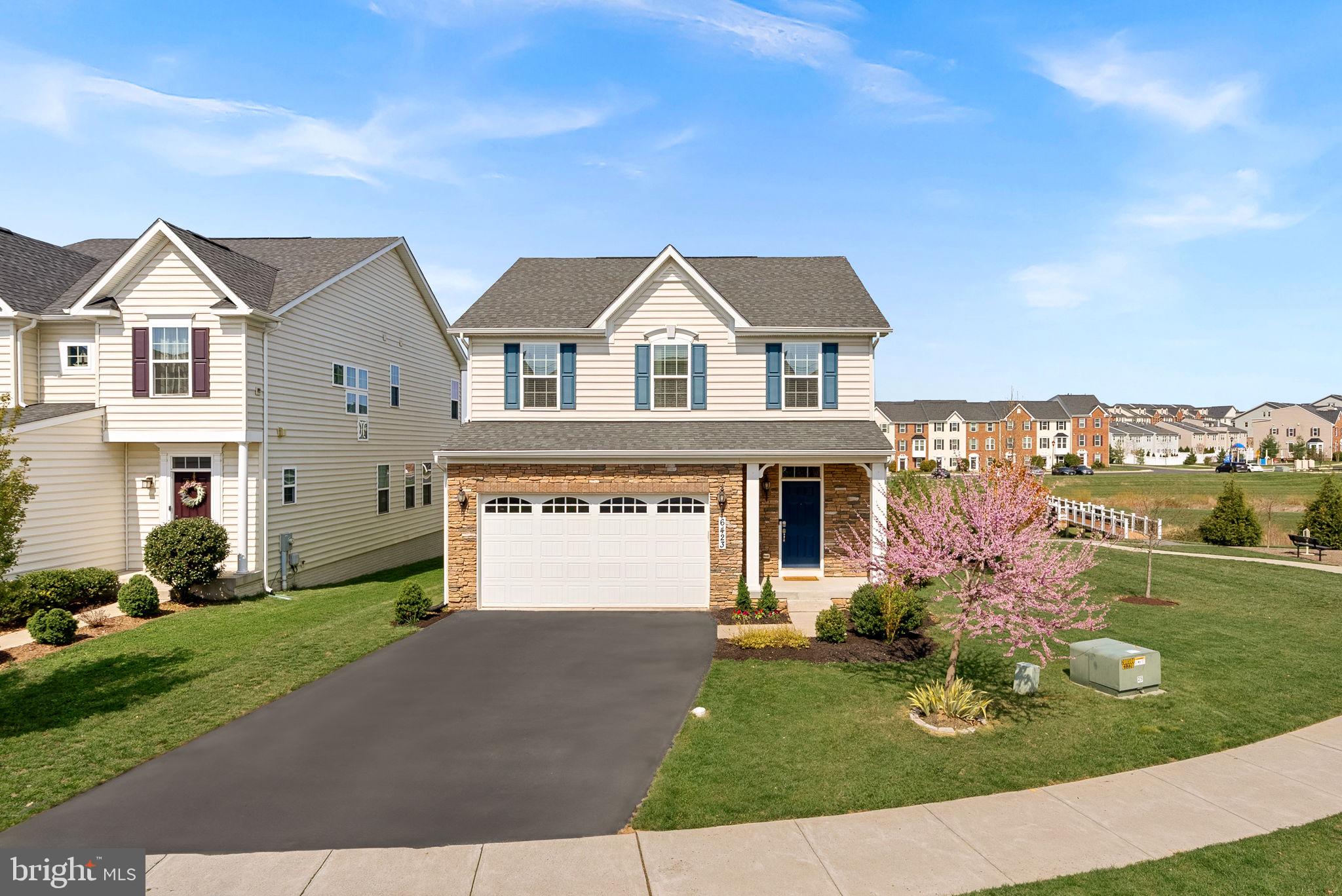 Built in 2017 and thoughtfully upgraded since, this beautifully maintained home in the sought-after Linton at Ballenger community offers over 3,000 square feet of finished living space and a peaceful backdrop of open green space.

From the moment you step inside, the attention to detail is clear. The open layout is anchored by a recently updated kitchen that’s been opened up to the bright morning room, creating an airy, welcoming space filled with natural light. With quartz countertops, a striking new tile backsplash, a large center island, and stainless steel appliances, this kitchen effortlessly combines function and style. Nearby, a formal dining area with custom trim is perfect for holiday dinners or entertaining guests. The adjacent family room provides a cozy gathering space, featuring a dramatic floor-to-ceiling stone fireplace and open views into the kitchen and morning room, making this entire main level feel cohesive and inviting.

Upstairs, you'll find four spacious bedrooms, including a generous primary suite with an elegant en suite bath and ample closet space. For added convenience, the washer and dryer are also located on the upper level. The fully finished lower level offers a large rec room, a full bathroom, and a flexible bonus room ideal for an office, gym, or guest space—plus additional storage options.

Out back, the fenced yard is ready for entertaining with a hardscape patio. A playground and walking trail just next door extend your outdoor space and add even more value to the location.

Additional features include a two-car garage, efficient gas heating and cooking, and a tankless water heater. With quick access to commuter routes, nearby Ballenger Creek amenities, and just minutes from the heart of Downtown Frederick, this home checks every box for style, space, and convenience.

Come experience it in person—schedule your private tour today!