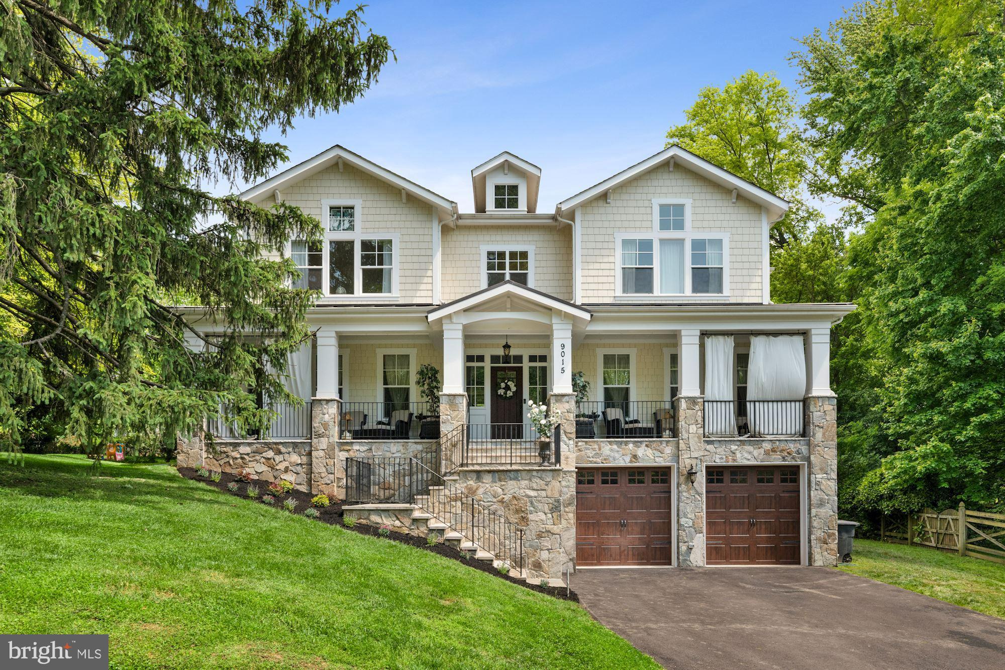 Prepared to be wowed!  Brand new construction by Classic Homes in 2019; enjoy move-in new construction without the hassle of the build!   Over 5,000 square feet on 3 finished levels and a spectacular private, expansive lot of almost a half acre!   Enough space to add a pool, sport court, trampoline -- the possibilities are endless.  From the welcoming front porch, step inside to find high 9 foot ceilings, hardwood floors and open, yet defined spaces flooded with light from the Western exposure.  The gourmet kitchen with custom cabinets, professional series appliances, and gorgeous quartzite island open to the table space and family room with fireplace.  The main level is completed by the butler's pantry with wine fridge, office space with wall of built-ins, dining room, living room and powder room.  Upstairs are 4 generous bedrooms and 3 full baths to include a spectacular primary bedroom with tray ceiling, 2 walk-in closets and en-suite bath with shower and separate soaking tub.  One of 2 laundry stations is located on the 2nd floor.  The lower level has access to the 2 car garage with storage, the 5th bedroom with en-suite 4th full bath, recreation room, powder room, gym, storage and 2nd laundry station.  Tucked away from the urban life though  The Woodend Nature Sanctuary, Metro, Downtown Bethesda with its shopping and culinary trends, and The Chevy Chase Lake Development are all just minutes away!