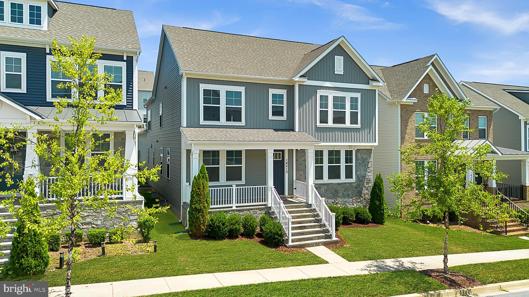 ONE OF THE LARGEST HOMES IN THE NEIGHBORHOOD (ALMOST 6000 SQ FEET) WITH HARD-TO-FIND MAIN LEVEL BEDROOM AND FULL BATHROOM. MODEL HOME CONDITION, UPDATED, AND COMPLETELY MOVE-IN READY. Experience exceptional space, refined finishes, and a thoughtfully designed layout in this impressive 5-bedroom, 5.5-bathroom Clarksburg residence. The home has been very lightly lived in, creating a fresh and well-cared-for feel throughout.
The main level welcomes you with updated wide-plank hardwood floors, oversized windows, and a balanced layout that blends open gathering areas with defined formal spaces. A main-level bedroom with a full bathroom adds a rare and valuable feature. The gourmet kitchen is the centerpiece of the main level, featuring a 5-burner cooktop, wall oven, large center island. The sellers spared no expense here, putting in Level 2 granite countertops when they bought it new. In addition, there is a walk-in pantry and generous cabinet and counter space. A butler’s pantry between the kitchen and dining room adds style and function.
The two-story family room offers a dramatic focal point with a beautiful floor-to-ceiling stone fireplace surround. The fireplace has never been used, and the room is prewired for stereo and audio/video, making it ready for a custom entertainment setup. The main level also includes a full-size dining room, formal living room, office with glass double doors, and powder room.
Upstairs, wide-plank hardwood floors continue throughout the bedroom level. The primary suite offers two walk-in closets and an elegant en-suite bathroom with dual vanities, granite counters, a soaking tub, shower, and updated tile flooring in the shower. There is a guest bedroom on this level complete with its own private bathroom, while two more bedrooms share a Jack and Jill bathroom with dual vanities.
The fully finished lower level expands the home with 1,978 square feet of finished space, including a large recreation area, full bathroom, and plumbing rough-in for a future wet bar. This level is also pre-wired for A/V and has an ingress/egress window for a potential 6th bedroom to be built. Community amenities include a clubhouse, pool, and playgrounds and the home is walking distance to Cabin Branch elementary. Located close to I-270, Clarksburg Premium Outlets, Black Hill Regional Park, and Clarksburg Village, this home delivers impressive scale, elevated finishes, and everyday convenience.