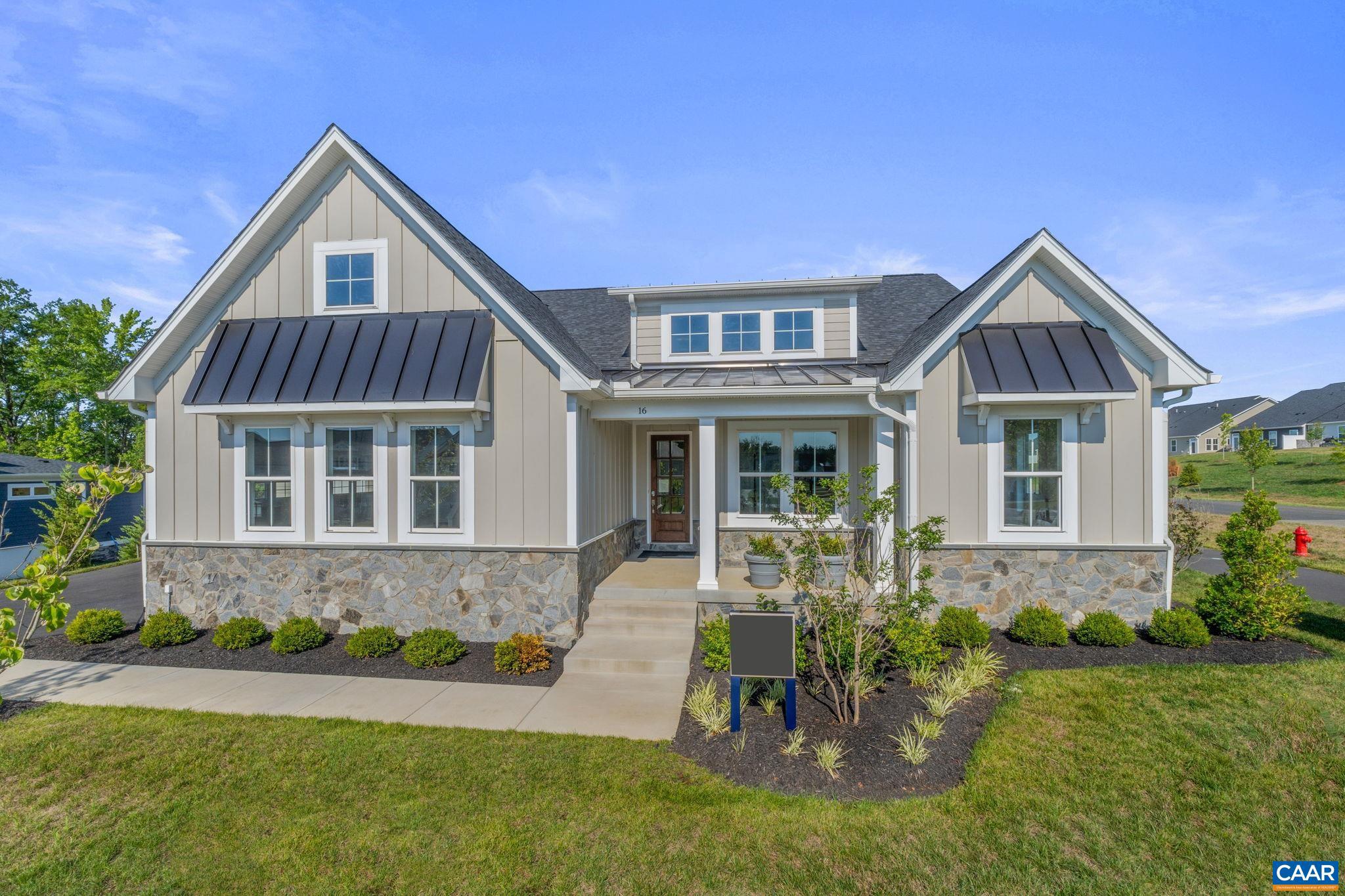 This Hickory model home showcases a wide range of custom finishes and carefully selected design details throughout. The main level features an open layout where the kitchen, dining area, and family room connect seamlessly, creating a natural gathering space highlighted by a gas fireplace. The primary bedroom is located on the main level and includes a spacious bathroom with a frameless glass shower, soaking tub, and separate vanities. Two additional bedrooms and a full bathroom are also on the main level, along with a pocket office, walk-in pantry, mudroom/laundry room, and an oversized two-car garage with third utility garage. The finished lower level expands the living space with a large recreation room, an additional bedroom, and a full bathroom, offering flexible options for guests, hobbies, or additional living areas. Outside, a custom patio provides a comfortable space to relax or spend time outdoors. Photos are of the actual home.,Painted Cabinets,White Cabinets,Fireplace in Family Room