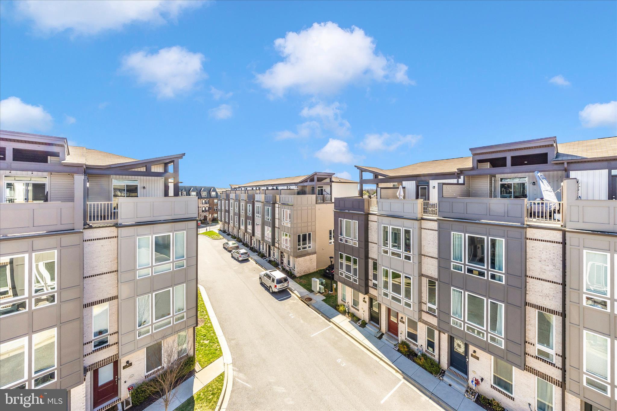 Built in 2021, this River Place Berkeley townhome offers 4 bedrooms and 4 full bathrooms across approximately 1,928 square feet of thoughtfully designed living space. The main level showcases an open layout highlighted by a chef-style kitchen equipped with stainless steel appliances, quartz surfaces, and a large central island ideal for gathering. Sun-filled living and dining areas connect effortlessly and are anchored by a warm fireplace, creating an inviting setting for hosting or everyday living.

The upper level includes a spacious primary suite complete with a walk-in closet and a luxurious bath designed for relaxation, along with two additional bedrooms and a shared full bathroom. On the entry level, a private bedroom with its own bath provides flexibility for visitors, remote work, or personal use.

Up top, a rooftop terrace delivers exceptional outdoor space for lounging or entertaining with elevated views. The home also includes an attached garage equipped with an electric vehicle charging plug and attachment, adding everyday convenience for EV owners. Conveniently located near downtown Frederick, retail, dining, and major commuter routes.