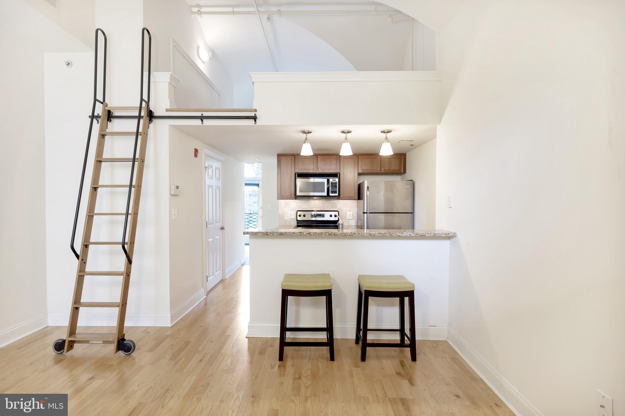 Beautiful Naval Square Condo plus Loft with included parking space included, located at historic Biddle Hall. Rarely available 1 Bedroom 1 Bathroom + Loft. Loft can be used as a guest sleeping area, study, or whatever you prefer! This home with views overlooking the Naval Square parade grounds features an open concept with in home washer/dryer, and full bathroom. The Chef's kitchen has stainless appliances, large granite island and plenty of cabinet space, all overlooking the great room area. Down the hall is a full bath with ceramic tile, extra wide vanity with sink and a shower & toilet area. The bedroom features access to the large deck. The spacious deck measures approximately 9 feet by 17 feet and has plenty of room for both dining and lounging. Separate storage locker also included with home. Naval Square is a beautiful 20-acre guard, gated community conveniently located in Graduate Hospital. A quick walk to Rittenhouse and Fitler Square, HUP, CHOP and UPenn. This 24 hour guarded gated community offers lush spaces, tons of guest parking, a huge community pool, a fully equipped gym and public rooms, all included. Owner pays HOA, water, and sewer. Tenant pays gas, electric, cable, internet, and phone. $80 per person application fee. One time $400 move in/move out fee. Must schedule move in with HOA during weekday. HOA requires at least 10 days from lease signed until move in. Minimum 1 year lease. No smoking. Pets on case by case basis. Application includes credit check, verification of income, verification of employment, criminal and background check, previous housing check.