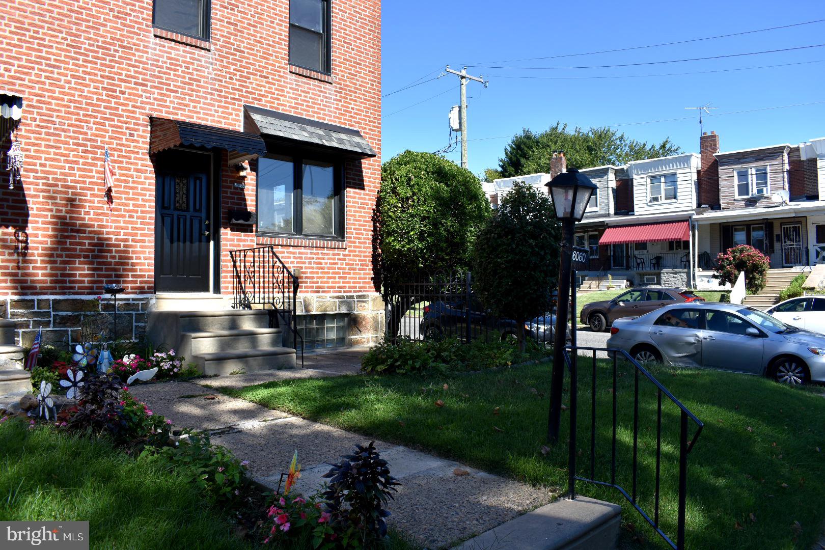 Polished and pristine and ready for the fall real estate market - welcome to 6060 Lawndale Avenue in Northeast Philadelphia! Approach a nostalgic brick property on a generously sized corner lot with green space and a quaint covered cement patio. Enter into a completely renovated and restored living space, showcasing a beautiful set of new flooring throughout, a newly installed crank-out front window as well as a conveniently adorned ceiling fan for added ventilation. Talk about cooling and heating: don't forget to take ease with the brand new central air conditioner and HVAC system recently installed. Continue through the home to a nicely sized dining area located next to the hand selected, designer kitchen. This upscale kitchen features a beautiful mixture of neutral tones across the granite countertops, back splash, and cabinetry. A deep stainless steel farm sink as well as a stainless steel appliance package complete this area! Venture upstair to two bedrooms with additional ceiling fans as well as just the right amount of closet space for his and hers belongings. Between the rooms is a full bathroom with brand new subway tiling and new vanity, showcasing the same aesthetics as seen throughout the rest of the home. You're now invited to explore the finished basement, featuring more neutral tones, brand new flooring, a unique rustic set of doors and hinges, as well as a second full bathroom with a glass enclosed tiled shower stall. To add to the living and entertaining space is the fenced in, rear yard. This generously sized space is ready for your customization and upcoming gatherings! This property is convenient to local shop and stores, as well as all major road and avenues of travel, including the Roosevelt Blvd as well as Oxford Avenue, which can easily take you the various neighboring section of the city to explore and enjoy. Consider adding seeing 6060 Lawndale Avenue to your list of homes today!