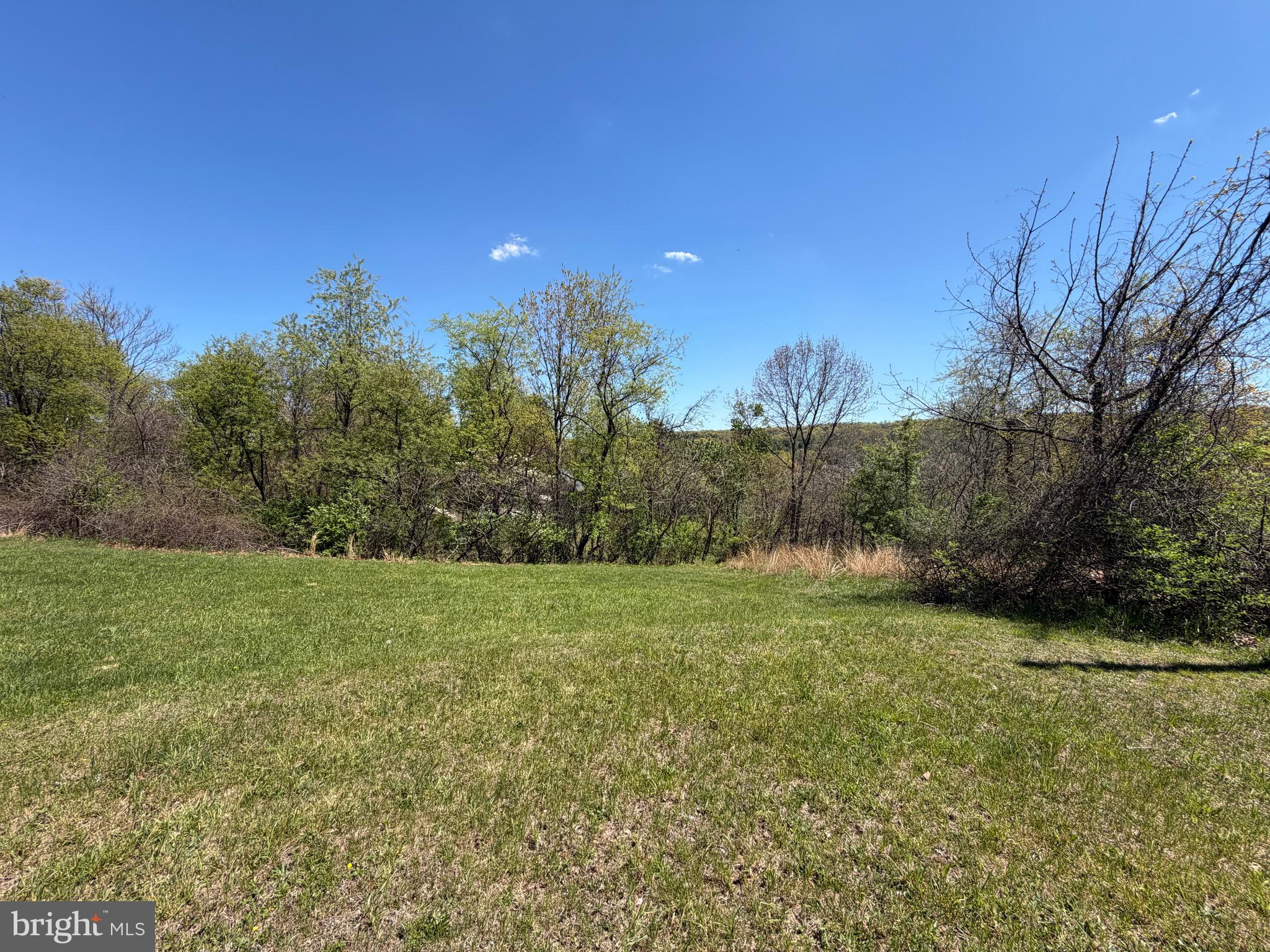 Just in time for your summer build you’ll want to check out this beautiful building lot in the desirable Lake Wynonah community.   Perched atop Red Oak Cove you’ll enjoy views of both Fawn Lake and the surrounding mountains.  With a slope to the rear of the lot, your dreams of a daylight basement can become a reality.  This property was previously perc approved and had a system design ready to build for a prior owner.  Those plans are available with listing documents.  Take a look, bring us your offer, then get ready to break ground on your new home!  Call today.  This is a gated community so an appointment is required to view.  For any questions regarding the dam repair on the large lake to take place over the approximately next four years contact the business office.  This is how you can obtain the most accurate and up to date information.