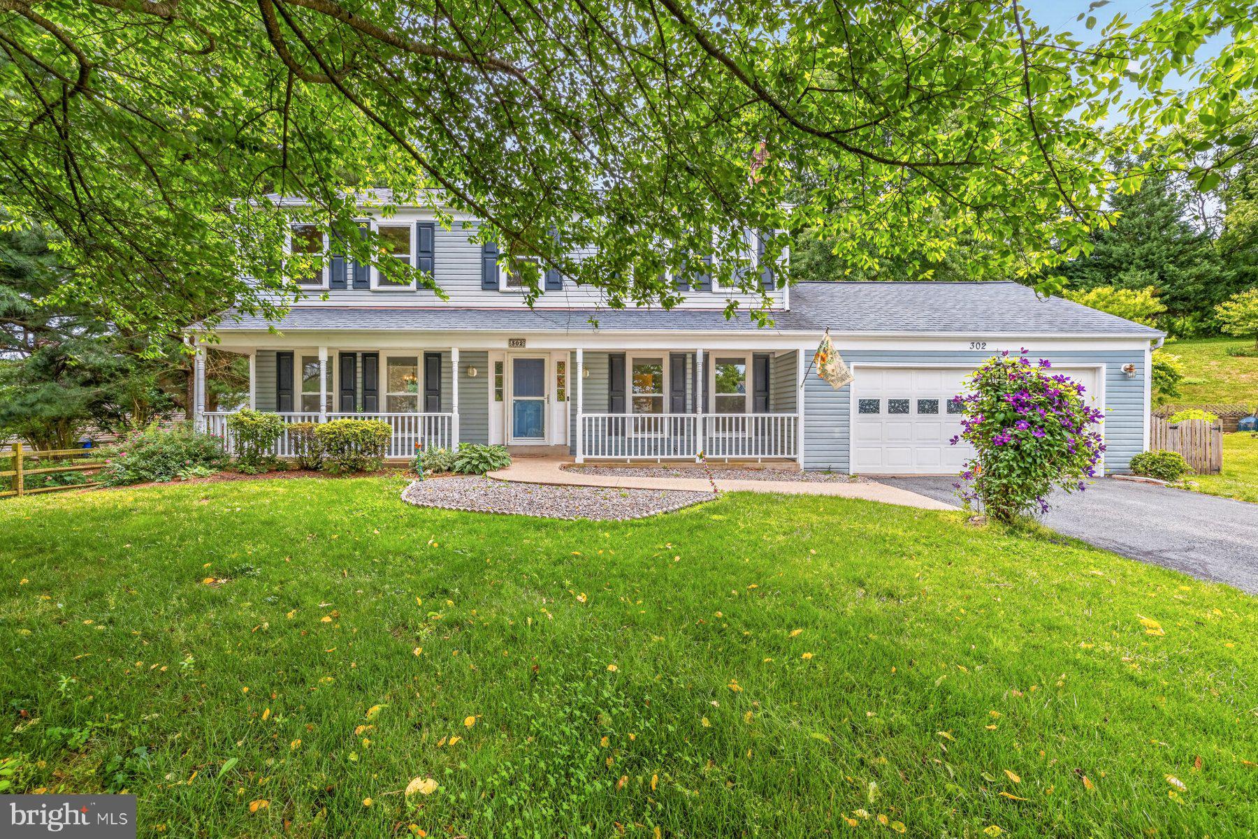 Welcome to this beautifully updated colonial tucked away on a quiet cul-de-sac in the sought-after Westridge community. A charming front porch and peaceful setting create the perfect first impression, while fresh paint throughout makes this home truly move-in ready. Step inside to a welcoming foyer that opens to spacious and inviting living areas. The main level features durable LVP flooring throughout, a formal living room, a separate dining room ideal for gatherings and a cozy family room anchored by a gas fireplace. The newly renovated kitchen is sure to impress with white shaker cabinetry, granite countertops, stainless steel appliances and ample workspace for everyday living and entertaining. A convenient main-level laundry and mudroom provides direct access to the attached two-car garage. Upstairs, you'll find four generously sized bedrooms, including a spacious primary suite complete with a private en-suite bath. Three additional bedrooms and a well-appointed hall bathroom offer flexibility for family, guests or home office needs. The fully finished lower level expands your living space with a large recreation and entertainment area, a full bathroom and a versatile bonus room perfect for a home office, gym, hobby room or guest accommodations. Outdoor living is equally impressive with a large deck overlooking the fully fenced backyard. Enjoy plenty of room to play, entertain, or relax with a dedicated playground area and a spacious storage shed for all your outdoor needs. Offering the perfect blend of comfort, updates, and location, this exceptional Westridge home is ready to welcome its next owner.