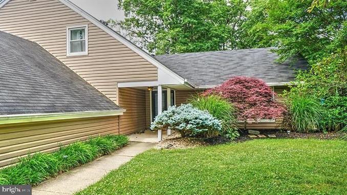 This Spacious and Gorgeously Updated 4 Bedroom, 3 Full Bath Located on a Professionally Landscaped 1/2 Acre Lot in a Cul-De-Sac.  This is One of the Larger Homes in the Neighborhood on One of the Bigger Lots.  The Custom Kitchen is Beautiful Functionality; Counter Space, Lots of Storage, Full-Sized Freezer and Full-Sized Refrigerator, Wall Oven and Built-In Microwave.  The Large Granite Kitchen Island Boasts Work Space, Cooktop, Storage and Seating.  Dining Room's French Doors Exiting into a Retreat Like Backyard.  Livingroom Is Open and Brightly Lit with Natural Sunlight and Nice Laminate Flooring.  The Foyer and Kitchen have Custom Slate Tiling.  The Huge Family Room is a Great Space to Relax with a Wood-Burning Fireplace and French Doors to the Backyard.  1 Bedroom and 1 Remodeled Bath on the Main Level as well as a Small Office/Hobby/Storage Room.  Upstairs is the Master Bedroom, with a Well Appointed Walk-In Closet and Updated Master Bath.  The 2 Additional Bedrooms share a Large Updated, Spa-Inspired Jack and Jill Bath and another Walk-In Closet.  Laundry Room Conveniently Located Upstairs too.  Oversized 2-Car Garage.  The Yard Feels like a Personal Oasis with its Professional Hardscaping and Landscaping.  Additional insulation added for reduced utility usage.