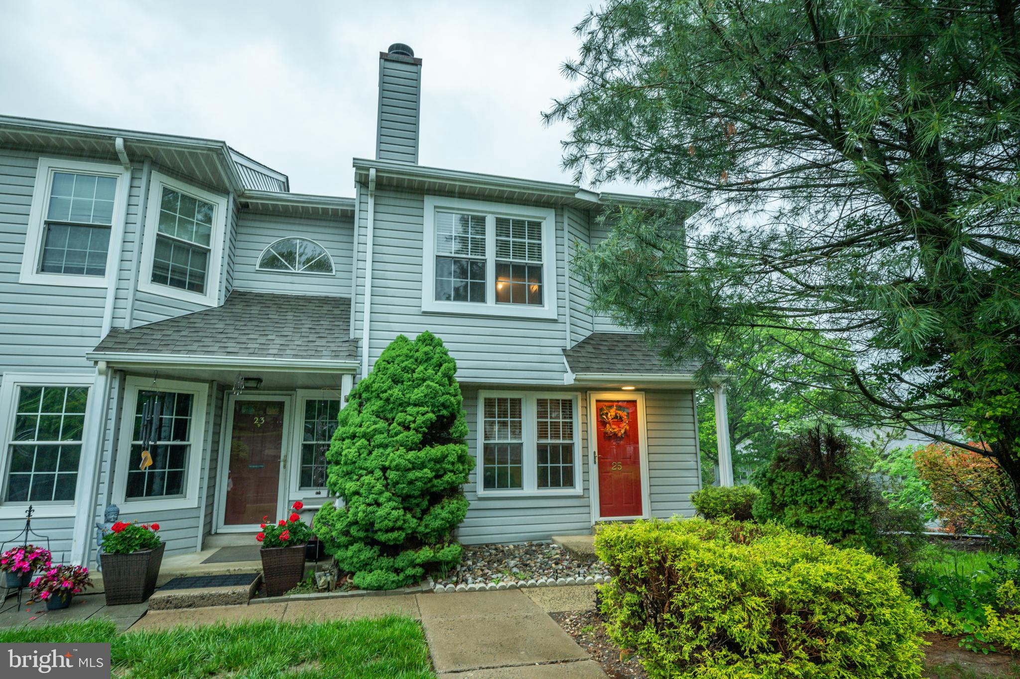 Welcome to this beautifully updated 2-bedroom END UNIT townhome w/ finished basement located in the highly desirable Timber Ridge community of Southampton. Offering a perfect blend of modern comfort and style, this home features contemporary upgrades and a neutral color palette throughout, creating a warm and inviting atmosphere. Step into your spacious living room filled with radiant light from the large front window, complemented by a decorative fireplace and an updated powder room for added convenience. The open layout flows seamlessly to your eat-in kitchen, which has been completely UPDATED with upgraded countertops, stainless steel appliances, built-in microwave, ample cabinet space and a dedicated dining area for casual dining with direct access to the second-level deck—perfect for indoor-outdoor entertainment! Upstairs you'll find two spacious bedrooms with carpeting and ample natural light. The primary suite features a ceiling fan and private access to the full hallway bathroom for added comfort and privacy. The updated full hallway bathroom featuring a tiled stall shower and a dedicated laundry closet complete this floor. Your fully finished WALK-OUT basement offers versatile living space—ideal for a playroom, home gym, office, or hobby area—along with a separate utility/storage room for added storage. Step outside to your charming paver patio overlooking a wooded common area, while the upper deck offers additional outdoor enjoyment with tree-lined views. Recent updates include NEW carpeting and NEW HVAC (2023)! Situated just minutes from shopping, dining, and major commuting routes including I-295 and Route 1, this home is also part of the award-winning Council Rock School District! Don’t miss your opportunity to see this beautiful home!