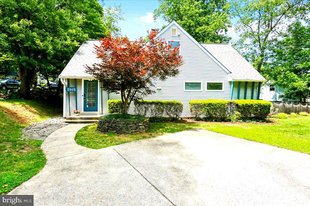 An exceptional find! Charming, unique, and surprisingly spacious Cape Cod offering nearly 1600 ft.², four bedrooms, two full baths, and a dugout partial unfinished basement (not included in tax record)  with abundant storage! Laundry chute  extends from second floor to basement where you’ll find the washer/dryer.   The foyer expansion includes custom built-ins and a storage bench.  Freshly painted, this home features newly refinished hardwood flooring on main level.   The open living and dining area showcases a floor-to-ceiling brick gas fireplace and back door (has doggy opening) leading to a newer stone patio, storage shed, and large private fenced backyard—perfect for entertaining! An updated kitchen with black granite countertops, white cabinetry with pull-out shelving, stainless steel appliances, and generous counter space with breakfast bar.  . The main level also offers 2 bedrooms, open closet with built-ins in master BR and a renovated full hall bath.  Walk upstairs to a large bonus room with unique built-ins that could be used as a study, playroom, or recreation area with two spacious bedrooms  on opposite sides with vaulted ceilings, walk-in closets/storage.  Second full hall bath with skylight.  Major updates within the past five years include the roof, HVAC, water heater, bathroom renovation, and French drain systems. Additional features include Anderson windows, plantation shutters, and a driveway for three cars.  Conveniently located near Twinbrook Metro and Wegmans.  For added peace of mind, home includes motion – activated security cameras, as well as front door combination lock.   Cape Cod home showcasing original charm and pride of ownership throughout, being sold as is.  Seller providing a one year home owner warranty! (several pics  were virtually staged).