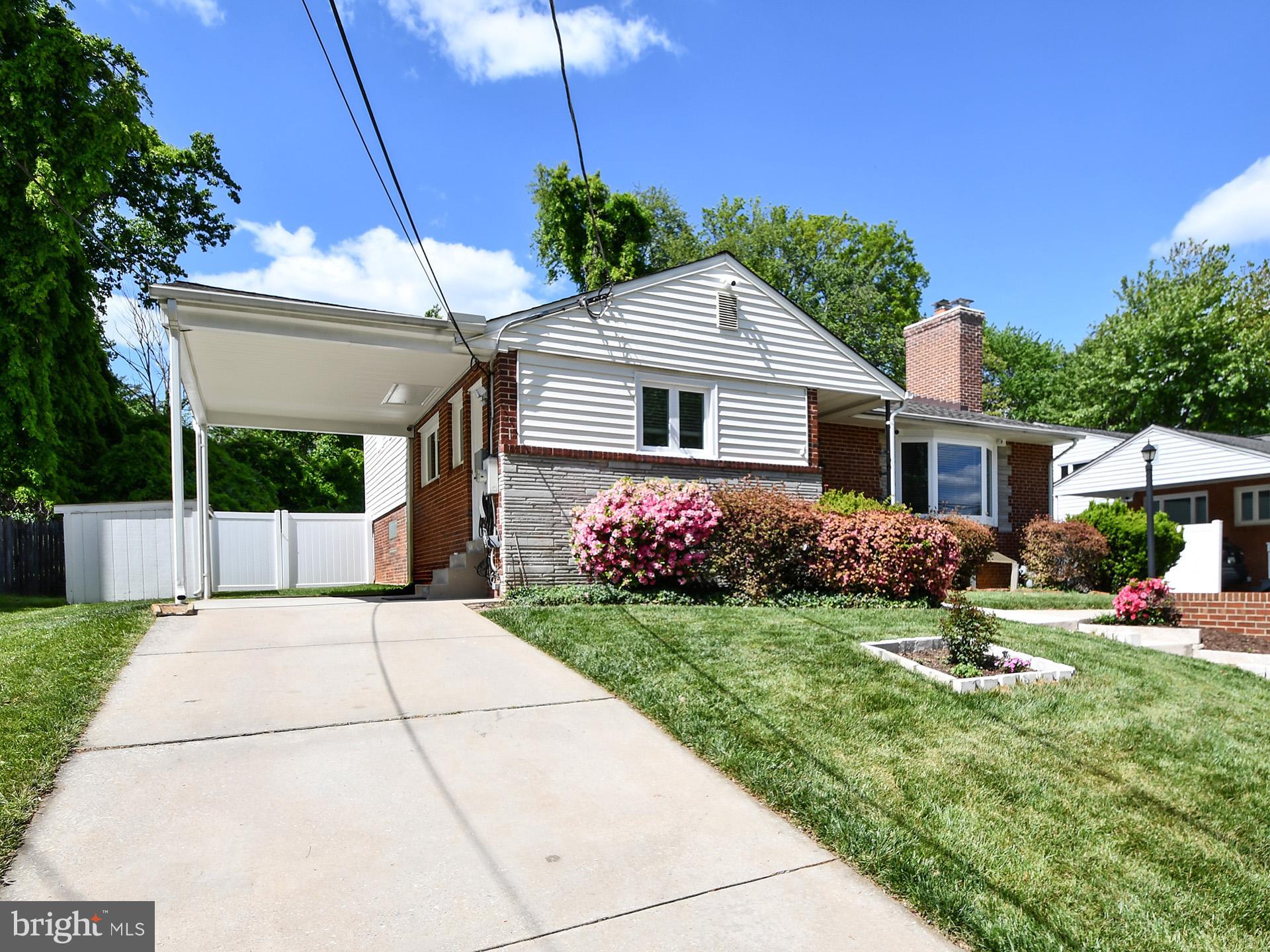 Welcome to this beautifully refreshed and deceptively spacious 5-bedroom, 3-bath split-level home, ideally situated in one of Bethesda’s most sought-after neighborhoods. Offering exceptional flexibility, thoughtful updates, and strong income potential, this residence is truly move-in ready with Accessory-Dwelling-units (ADUs) permit from Montgomery County. 
Freshly painted interiors, a renewed kitchen, new windows, and stylish tile flooring create a bright, modern ambiance throughout. Far larger than it appears from the outside, the home’s well-designed layout easily accommodates today’s dynamic lifestyles.
A charming front porch invites you to unwind before stepping into a sun-drenched, expansive living room featuring vaulted ceilings and a cozy fireplace—perfect for both everyday living and entertaining. The efficient galley kitchen is well-equipped with generous cabinetry, ample counter space, a spacious pantry, and new appliances. An adjoining dining area ensures a seamless flow for casual meals and gatherings alike.
Upstairs, the private primary suite provides a serene retreat with a closet and en-suite bath. Three additional well-sized bedrooms share an updated hall bathroom, offering comfort and versatility for family, guests, or home office needs.
The lower level stands out for its remarkable adaptability. With a separate entrance, it includes a living area, full kitchen, bedroom, full bath, and its own washer and dryer—ideal for multi-generational living, rental income, or a private guest or studio suite.
A fully finished basement further expands the home’s functionality, offering abundant storage, an additional laundry area, and endless possibilities for recreation, organization, or future customization.
Combining modern updates, a flexible floor plan, and built-in income potential, this home presents a rare opportunity in a prime Bethesda location. Don’t miss your chance to own a property that delivers both space and versatility in an exceptional setting. Owner is a license real estate agent.