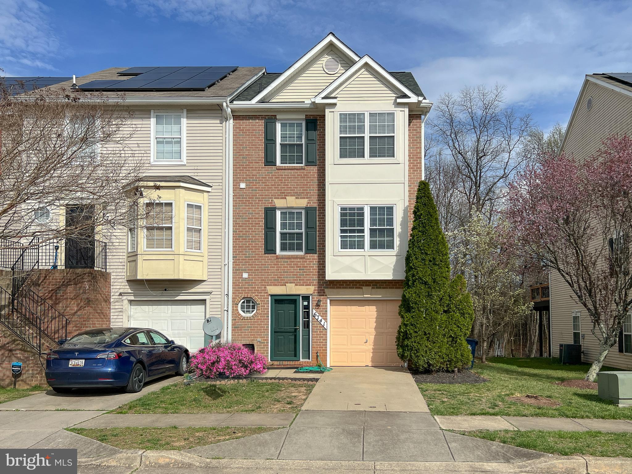 *** Back on market.   *Rare Opportunity – Stunning Brick-Front End-Unit Townhome! Don’t miss the chance to own this thoughtfully remodeled end-unit townhome in a peaceful, well-maintained community. This gem boasts an abundance of natural light.
Recent Updates: Newer roof (2023), Freshly painted interior, brand new floors and carpet, Renovated upstairs bathroom and several new windows.
Spacious & Stylish Living: The eat-in kitchen features granite countertops, a sleek backsplash, and stainless-steel appliances. The raised dining area overlooks a gorgeous living room and a convenient half bath.
Generous Bedrooms & Luxurious Baths: Upstairs, you’ll find three bedrooms, including an oversized primary suite. A shared full bathroom rounds out the space.
Versatile Lower Level: The ground floor offers a flexible space that can be used as a bedroom, secondary living area, or multipurpose room, complete with a cozy fireplace. Walk out to the covered patio and backyard. This level also offers garage access (1-car attached), laundry room and another half bath.
Exceptional Educational Opportunity: This home is served by Eleanor Roosevelt High School with magnet Program. 
Prime Location: Easy access to major highways: I-495, I-95, and I-295, Hospital just a few blocks away, Across the street from Schrom Hills Recreation Park, Close to shopping & dining: IKEA, Costco, and more. Convenient to both DCA and BWI airports.
This gorgeous home offers the perfect blend of comfort, convenience, and charm. Don’t wait—schedule your showing today!