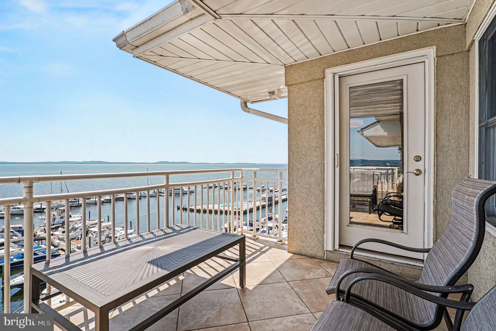 Don't miss this luxury penthouse-level condo. Features a nicely appointed primary suite and a large guest bedroom and bath plus a study. Furnished for immediate use with a ten-mile, front-row view of the Chesapeake Bay.  Enjoy sailing races, amazing sunrises and fireworks from your private balcony,  Marina and Park at your doorstep. 

Inside... climate control air and water are provided with central humidity control,
 AprilAir HEPA filtering, and a heat-circulating water pump to keep all faucets warm.
All rooms are designer styled with special crown molding plus faux and deep color finishes as well as ceiling fans with lights. The kitchen is fully paneled and includes a skylight, a SubZero fridge, Viking baking and warming ovens, induction cooktop, Asko dishwasher, wine cooler, recently replaced engineered hardwood flooring, a walk-in pantry, filtered water, and quality dishware. 

Complimenting the amazing view, the living room has a recliner sofa, an air-circulating  gas fireplace, Samsung TV with ceiling surround sound, and a remote-controlled sun-filtering shade that can be programmed to reduce direct morning sunlight. The dining area includes a table with extender leaf, upholstered chairs, hutch, and sideboard, The study includes an executive desk and bookcase with glass doors. The balcony has comfortable, weather resistant chairs and a coffee table.

The primary suite includes a  dual side controlled motorized bed, walk-in and second closets, wall-mounted TV,  toilet room with  bidet, grab bars, linen closet, built-in vanity, balcony door, and quality furniture. The second bedroom has a comfortable sofa bed with extra mattress, slant-front secretary desk, and a display cabinet. 

All this plus a walk out to the renowned Havre de Grace Concord Point Park and historic lighthouse and 
¾-mile, bayside promenade. Heron Harbor  provides luxury living for weekends, summers, or permanent residence. Only a few blocks from the newly renovated downtown shopping district and restaurants. Close to shopping, I-95, MARC & AMTRAK trains and just under an hour to BWI and Phila airports.