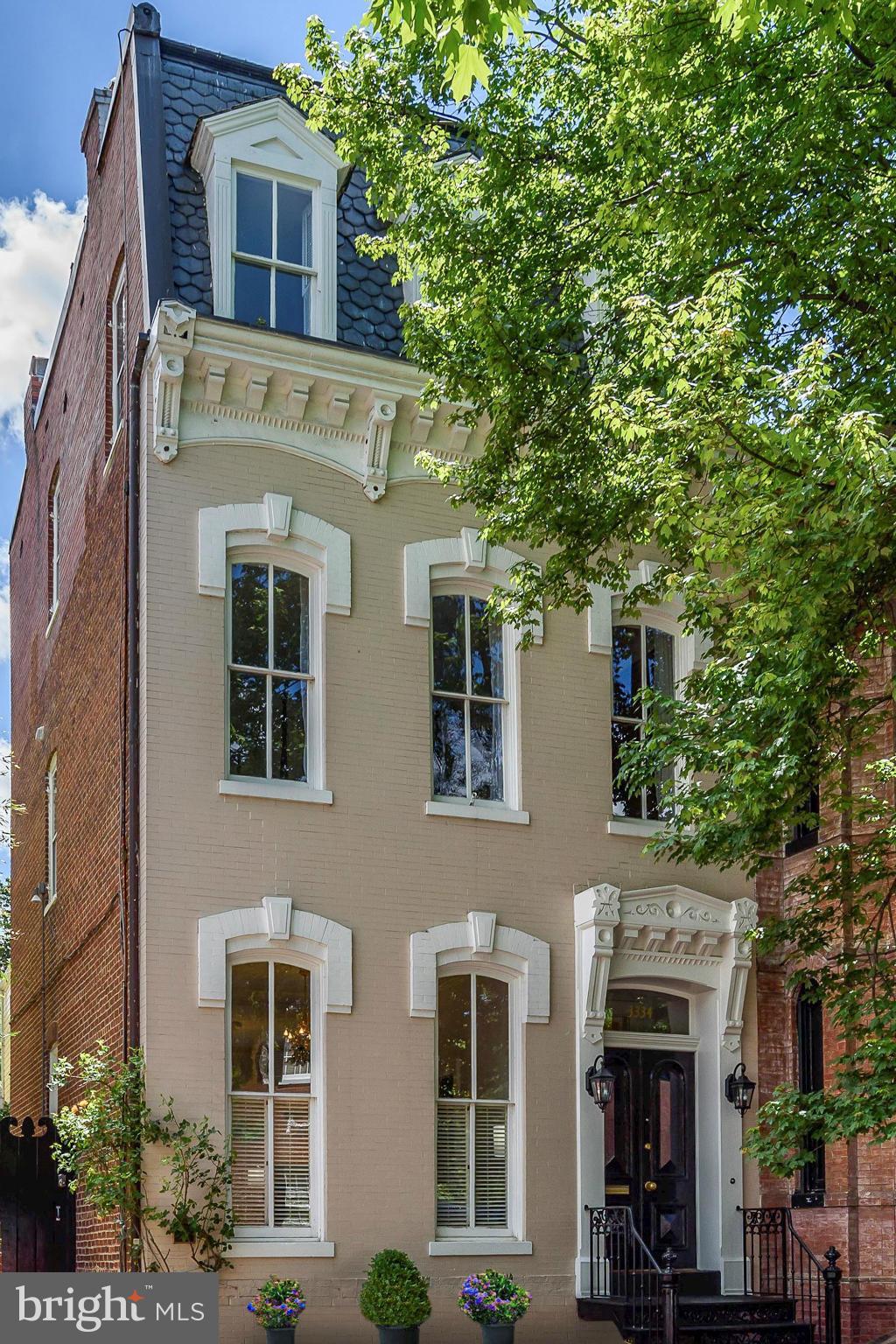 Light-filled Second Empire Victorian w 4 BR and 3.5 BA. Every room is filled w light from multiple exposures & French doors to the wrap-around garden from every room on the entry level! The 2nd level includes the mas. suite with BA and dressing room, the laundry RM and another BR with en-suite BA. The top level is 2 BRs and a full BA. The covered parking around the corner on Prospect St conveys.
