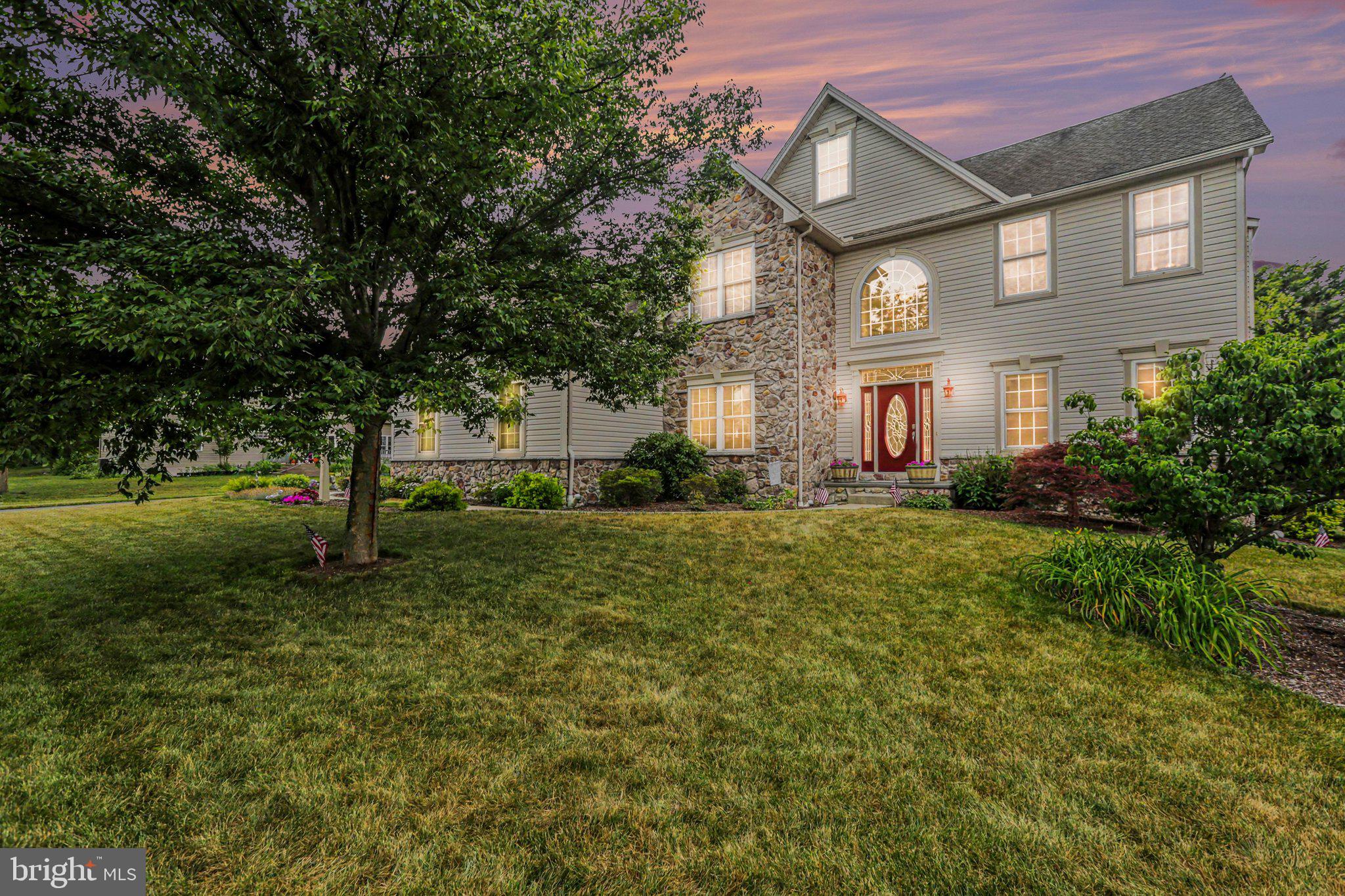Welcome to 7329 Cobblestone Drive, a beautifully maintained home in the sought-after Millstone community near Central Dauphin High School. This impressive residence offers over 4,700 square feet of finished living space with quality upgrades and thoughtful details throughout.

The welcoming two-story foyer leads to elegant living and dining areas, a spacious family room with vaulted ceilings, skylights, and a striking stone gas fireplace. The gourmet kitchen features rich wood cabinetry, a large island, walk-in pantry, and a bright breakfast area that opens directly to a great outdoor entertaining area - a custom pavered patio with hardscaping, fire pits, and views of open recreation space plus neighborhood walking trails.

Additional main-level conveniences include a flexible-use study, powder room, laundry/mudroom, and the 3-car side-entry garage. Upstairs, the luxurious master suite offers a private retreat with spa-like bath and custom closet, plus three more generous bedrooms. 

The fully finished lower level delivers even more living space with a large gathering area, exercise room, workshop, and abundant basement storage, a flexible-use room that can provide excellent options for home offices, guests, or hobbies, plus Bilco doors for outside access. Enjoy dual-zone HVAC, central vacuum, and the convenience of a great neighborhood with walking trails just steps away.

This move-in-ready home combines comfort and functionality in one of Harrisburg’s most desirable locations. Schedule your tour today!