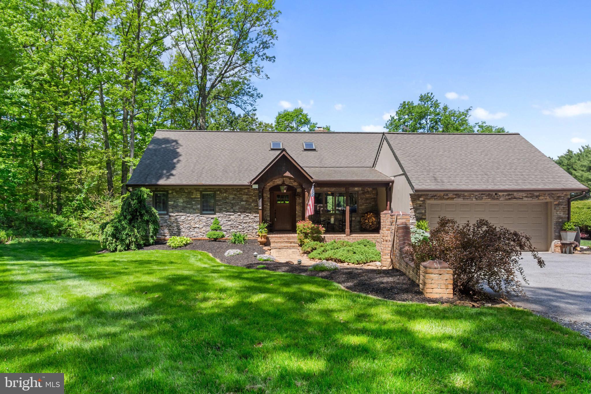 Tucked into the peaceful countryside of Manchester, offers a balance of privacy, comfort, and meaningful updates while still being convenient to everyday needs, including being just minutes from Christmas Tree Park.

Inside, the kitchen has been recently updated with modern finishes and newer appliances that make both daily living and hosting feel easy. The bathrooms have also been renovated with a clean, refreshed style that carries throughout the home.

The finished basement adds a completely different layer of living space, designed with intention and flexibility in mind. It works just as well for entertaining as it does for relaxing, and the wet bar makes it a natural gathering spot.

Out back, the setting really comes together. The deck overlooks the pool and creates a space that feels private and usable, whether it is for summer get-togethers or a quiet evening outside.

There are two fireplaces that add warmth and character, along with practical upgrades that matter, including a backup generator, updated appliances, and a newer roof.

This is a home where the major pieces have already been taken care of, allowing the next owner to simply move in and enjoy it.