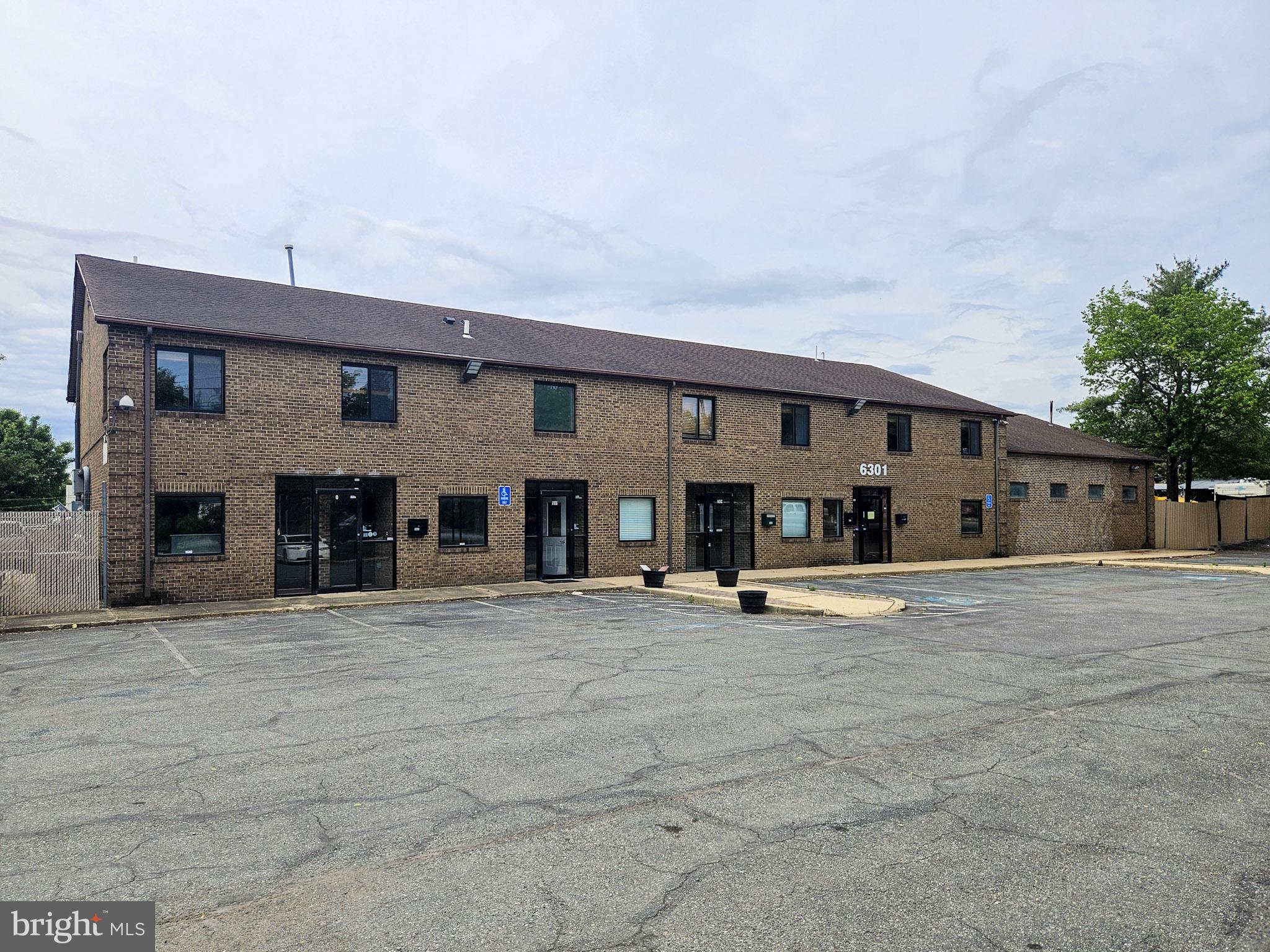 MAJOR PRICE IMPROVEMENT!  Welcome to this well located building and property, zoned IE, and sitting on approximately 1.31 acres.  The main part of the building is 2 stories of finished office/retail type space with each level having about 3680 gross square feet.  Attached to that is a warehouse style portion with 15 foot ceilings and two 12 x 12 garage doors.  In the back parking lot there is also a +/- 800 SF metal style building with a 10 x 10 garage door.  The front parking lot is paved and open.  The rear lot is mostly paved and fully fenced.  The buildings (except for the metal style building) are brick and block construction.  This would be a great building for a user who also wants to have some spaces to lease out for income.  Well located off of Dower House Road and centrally located from Rt 4 to either the Beltway or Route 301.  The owner ran his stone/granite business from here for many years and has retired and does not need the building any longer.