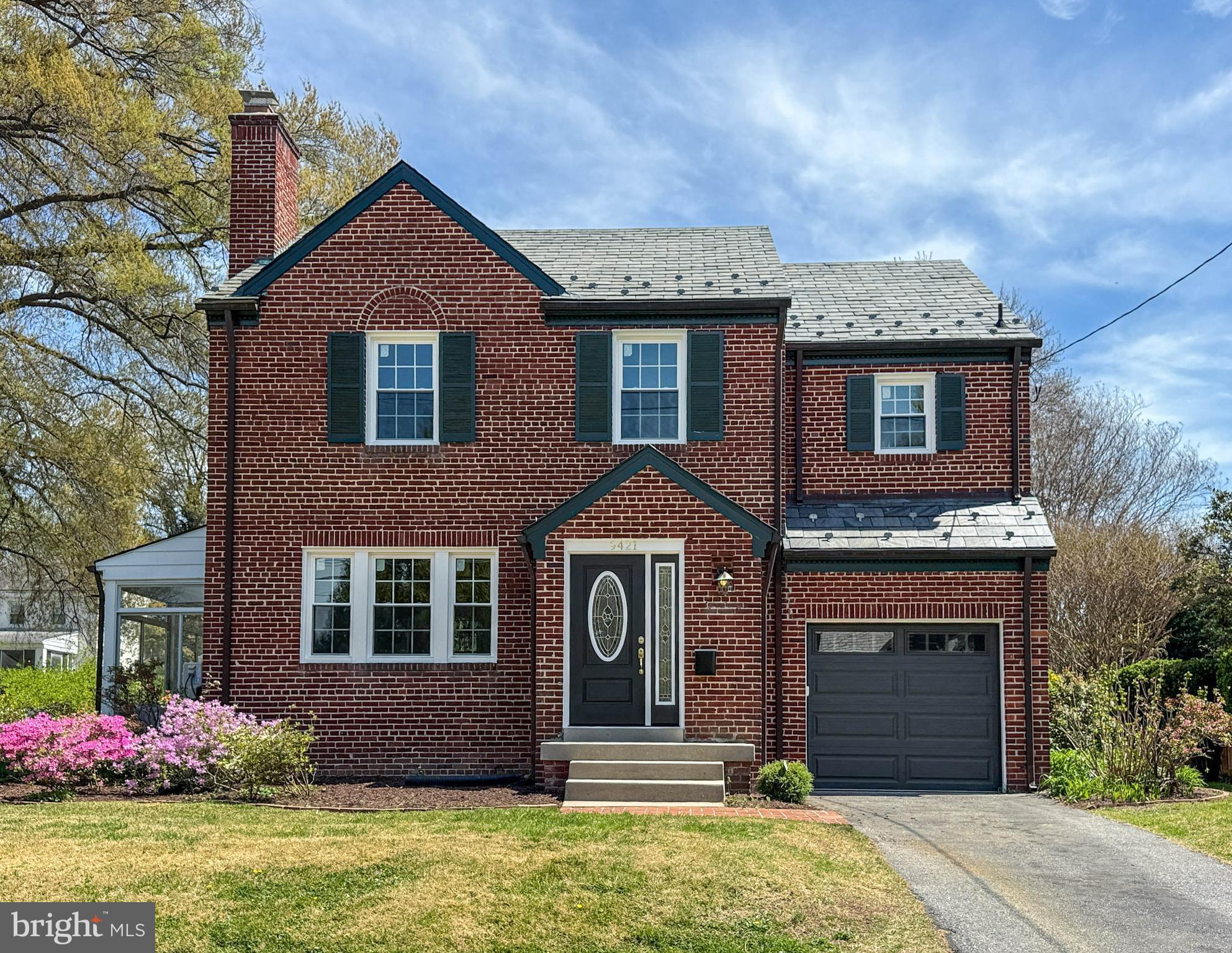 Welcome to this charming all-brick Colonial in the coveted North Hills Sligo Park neighborhood, where timeless 1945  craftsmanship meets stunning 2026 renovations. Featuring a slate roof (2020), brand-new high-efficiency windows, new exterior doors, new 200-amp electrical service, and four finished levels of living space, this move-in ready home offers luxury, comfort, and peace of mind.
Step through the etched-glass front door into a dramatic marble foyer with vaulted ceiling. The sun-filled living room showcases new solid oak hardwood floors, original architectural trim, art-focused recessed lighting, and a wood-burning fireplace. Elegant crown molding leads to the formal dining room—perfect for entertaining.
The beautifully renovated chef’s kitchen (2026) is a standout feature with bookmatched granite countertops, matching granite backsplash, all-new high-end smart appliances, custom soft-close cabinetry, and brushed-brass hardware. An adjoining breakfast nook includes a built-in coffee bar and charging station.
Upstairs, enjoy a spacious two-story primary suite plus two additional generously sized bedrooms, a fully renovated hall bath (2026), and a dedicated laundry room with new full-size washer and dryer (2026). All bedrooms feature new premium stain-resistant carpeting with 25-year warranty.
The private dual-level primary suite offers a finished loft retreat with walk-in closet and ideal home office or reading room. The luxurious ensuite bath (2026) features marble finishes, custom quartz vanity, and oversized walk-in shower with integrated seating.
The fully renovated lower level (2026) adds a large family room and half bath. An attached garage provides convenience, while the detached shed offers flexible space for a studio, gym, office, or workshop.
Outside, enjoy a quiet flat backyard in one of Silver Spring’s most desirable tree-lined neighborhoods. Steps to Sligo Creek Park trails and playgrounds, with easy access to Forest Glen Metro, I-495, the future Purple Line, and Downtown Silver Spring dining and shopping.
Rarely does a renovation of this caliber come to market. Move in, relax, and enjoy the best of Silver Spring living.