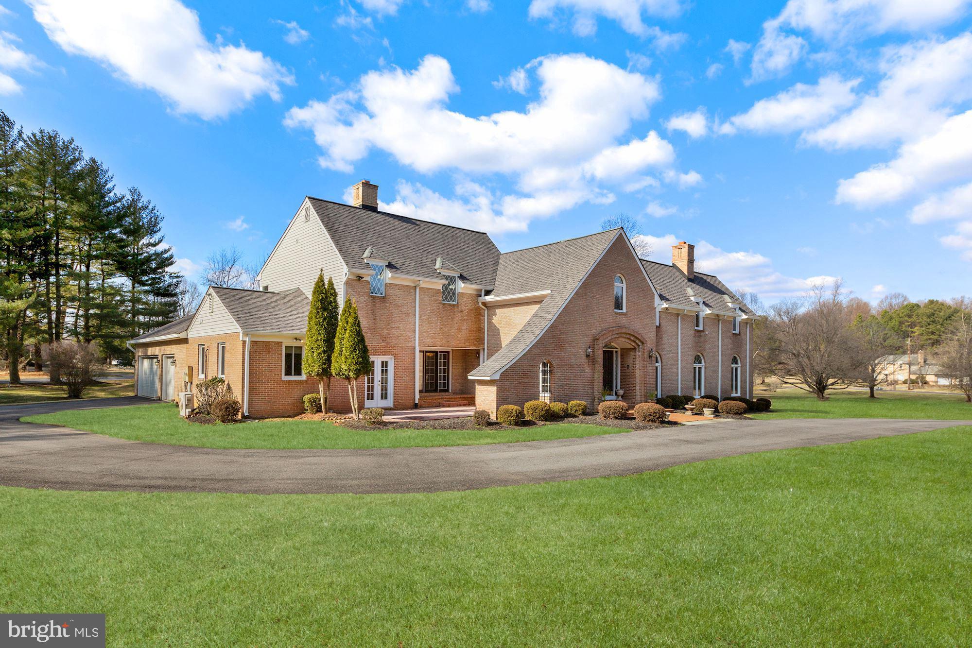 Imagine...wide open spaces where you can relax and let go of the stresses of everyday life.  Come enjoy this custom built colonial with an open and airy floor plan on two attractive, level acres.  The home was significantly rebuilt in two major phases: 1984 and 2005.  It has amazing interior spaces!  The welcoming entry foyer offers a dramatic, two story entrance with a step down to the formal living room.  If you are working out of the house, a wonderful, private library with built-ins allows you to work quietly and without distraction.  The Formal Dining Room will seat at least 12 people and has a fireplace for ambiance in the winter and a terrace for spring and summer soirees.  The big, open Kitchen/Family Room is an inviting space for all to gather.  It offers a center island and butler's pantry plus access to the rear yard.  The bonus room is an additional space to escape to maybe a yoga room, exercise room, hobby room, guest suite- you name it.  Upstairs are five bedrooms including a sumptuous Owners Suite with great views overlooking the backyard.  A fun added space is the Game Room space between Bedrooms 4 and 5.  It could be a playroom, game room or whatever your family desires.  The Recreation Room is BIG with a wet bar space and offers incredible options for entertaining once the pandemic ends.  It, too, is full, daylight with double access to the rear yard.  The house sits beautifully on the lot and offers a circular driveway with loads of additional parking and a side entry, three car garage.   There's easy access to  the shopping and amenities at Shady Grove/Falls Grove or Potomac Village; the I-270 Corridor and I-200, the InterCounty Connector.  Come enjoy this terrific option!!  Make it yours today!!