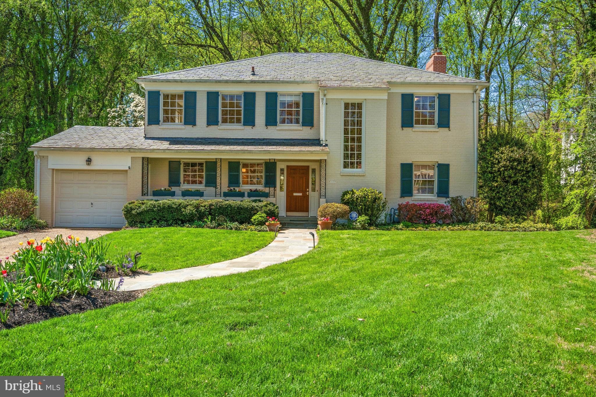 Nestled at the end of a peaceful cul-de-sac in one of Chevy Chase’s most highly coveted neighborhoods, The Hamlet, this classic brick colonial offers a rare blend of timeless architectural integrity and modern refinement. Positioned on an expansive 0.6-acre lot, 8224 Kerry Court is a sun-drenched home designed for both comfortable daily living and elegant entertaining, with rear gardens offering unparalleled privacy. Whether you are hosting a summer garden party or enjoying a quiet morning coffee, the expansive green space provides a tranquil escape rarely found in 20815. The main level has sweeping views of the trees from the dining room and living room, and is highlighted by a renovated Jack Rosen Custom Kitchen, a den, large foyers, and a half bath. Rest and retreat to the second level featuring a primary ensuite with high-end finishes, renovated and expanded full bath, and 3 additional bedrooms with a shared hall full bath. The lower level offers a 5th bedroom, for family and guests alike, with a full bath. The attached one-car garage provides secure parking and additional storage, seamlessly integrated into the home's traditional silhouette.

Living at 8224 Kerry Court allows you to have the best of Chevy Chase at your fingertips. You are just a short stroll away from the newly developed Chevy Chase Lake shops and fine dining. For the outdoor enthusiast, the proximity to the Capital Crescent Trail and local parks offers endless recreation opportunities. Experience the perfect harmony of private, spacious living and urban convenience.
