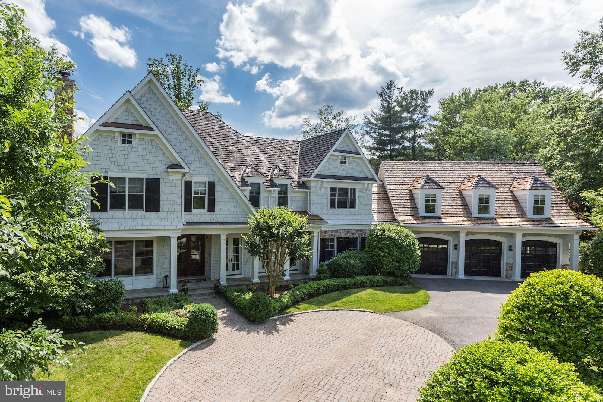 Custom built by Artisan in prestigious Spring Hill Farm. Offers exceptional, designer finishes! 9,200+ sqft of thoughtfully planned space with fantastic light.Incredible back yard with screened porch, pool, outdoor kit, sport court, lovely water feature, expansive lawn, patios, fenced, etc. All Bedrooms with en-suite Baths & Main Level Bedroom. 6 Fireplaces, Mahogany Library, walk-out LL w/ wine room, bar, exercise, Bedroom & Bath. Flexible spaces throughout.