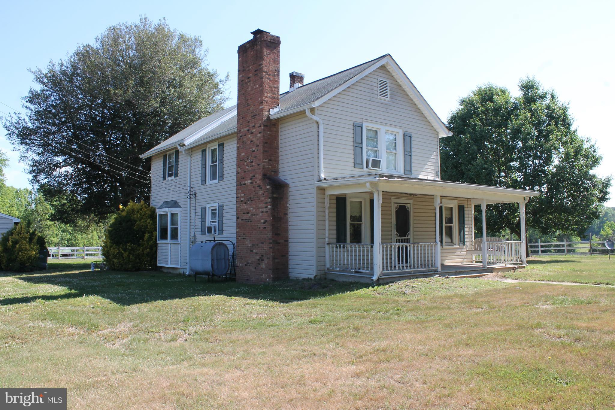 2 lots combined together to give a total of 38.08 Acres. tax map #49-4-1b consists of 10.21 acres and there are several structures on the property including a 4 bedroom 1 1/2 bath farmhouse, 2 car garage, 10 stall center isle horse barn with hot/cold wash rack, 5 large paddocks with run in sheds and  2 storage sheds. Tax id #49-4-1  consists of 27.87 acres of partially wooded acreage.. These are only being sold together.  With a prime location near Rte 1 and the amount of road frontage on Hickory ridge rd the value is in the land.