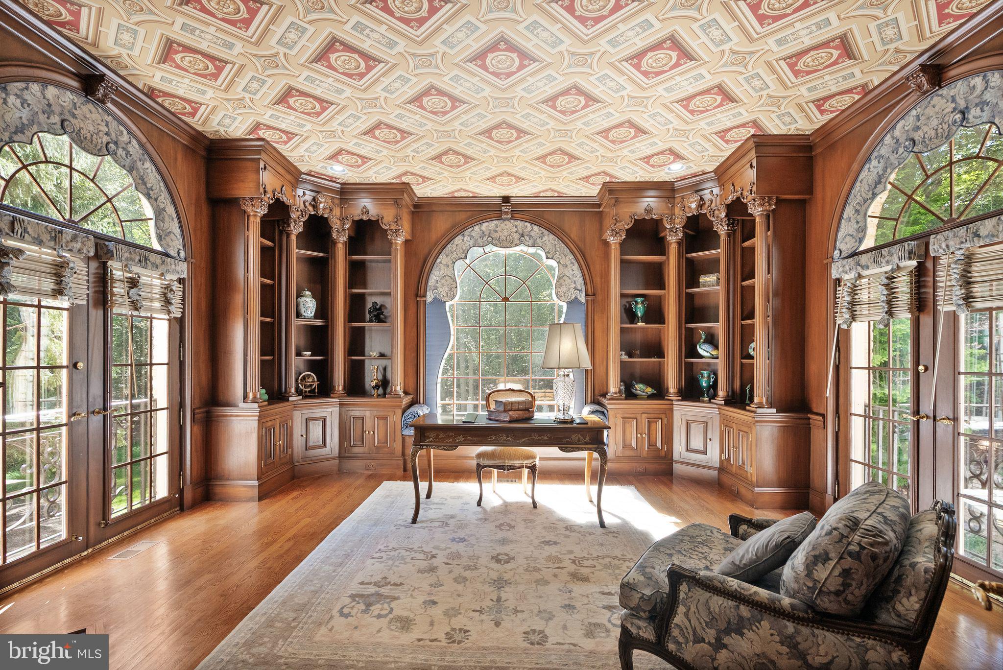 Welcome to 9721 Sorrel Avenue — A Landmark Potomac Estate Where Architectural Artistry Meets Exceptional Living

Designed by renowned architect John Leslie Neufeld, this extraordinary residence offers a rare opportunity to own a truly distinctive estate in one of Potomac’s most prestigious and private settings. Defined by dramatic architectural lines, sweeping curves, and grand proportions, the home delivers both impressive scale and warm livability.

From the moment you arrive, the property makes a lasting impression with a 100-year genuine slate roof, elegant circular driveway, and a separate private motor court, all set within beautifully landscaped grounds that create a sense of arrival and exclusivity.

Inside, expansive light-filled interiors showcase soaring ceilings, custom plaster moldings, rich hardwood floors, and intricate millwork. Designed for both grand entertaining and everyday comfort, the main level features gracious formal living and dining rooms alongside a stunning sun-drenched family room with walls of windows and an expansive skylight.

At the center of the home is the chef’s kitchen, thoughtfully designed with premium appliances, custom cabinetry, a generous island, and a convenient rear staircase connecting the living spaces seamlessly.

One of the home’s most remarkable highlights is the hand-carved walnut library, a true work of art that adds warmth, character, and architectural distinction rarely found today. The residence also offers exceptional lifestyle amenities, including a disco lounge, golf simulator room, and game room, creating unforgettable spaces for entertaining and recreation.

Upstairs, the luxurious primary suite serves as a private retreat with a sitting area, marble fireplace, spa-inspired bath, and dual walk-in closets. Each additional bedroom is generously sized with its own en-suite bath, providing comfort and privacy for family and guests.

The walk-out lower level offers flexible living space ideal for a home theater, fitness studio, guest quarters, or extended-stay accommodations. Outdoor living is equally impressive, featuring a copper-roof gazebo, fountain with classical statuary, expansive entertaining terrace, and manicured grounds surrounded by mature trees, creating a peaceful and private estate setting.

Ideally located near Potomac Village, top-rated schools, parks, and major commuter routes, this home combines architectural significance with everyday convenience.

9721 Sorrel Avenue is more than a residence — it is a statement of design, craftsmanship, and lifestyle rarely available in today’s market.
Experience a home that is truly unforgettable.