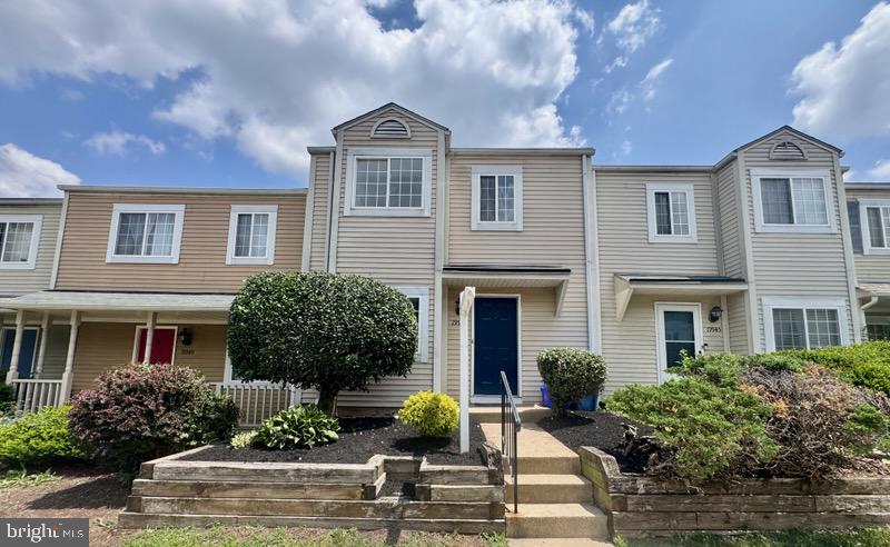 Welcome to this beautifully updated 2-level townhouse in the highly desirable Brandermill community. What truly sets this home apart is the brand-new luxury vinyl plank (LVP) flooring throughout both the upper and lower levels, creating a modern, cohesive look that’s both stylish and low maintenance. Combined with fresh paint throughout, this move-in ready home offers the perfect blend of comfort and convenience. The bright, inviting main level features elegant chair rail and crown molding, a spacious living and dining area, and a well-appointed kitchen with granite countertops, stainless steel appliances and a beautiful tile backsplash. Step outside to a large, fully fenced backyard with a brick patio and shed, an ideal space for summer BBQs, entertaining guests, gardening, or simply relaxing. Upstairs, you’ll find two generously sized bedrooms and two full bathrooms, offering comfortable living with privacy and flexibility for families, guests, or a home office.   Conveniently located just minutes from I-270, the MARC train station, major bus routes, Milestone Shopping Center, parks, restaurants, and everyday shopping, this home combines a peaceful neighborhood setting with outstanding commuter access.  Open Sunday July 5 1-4pm