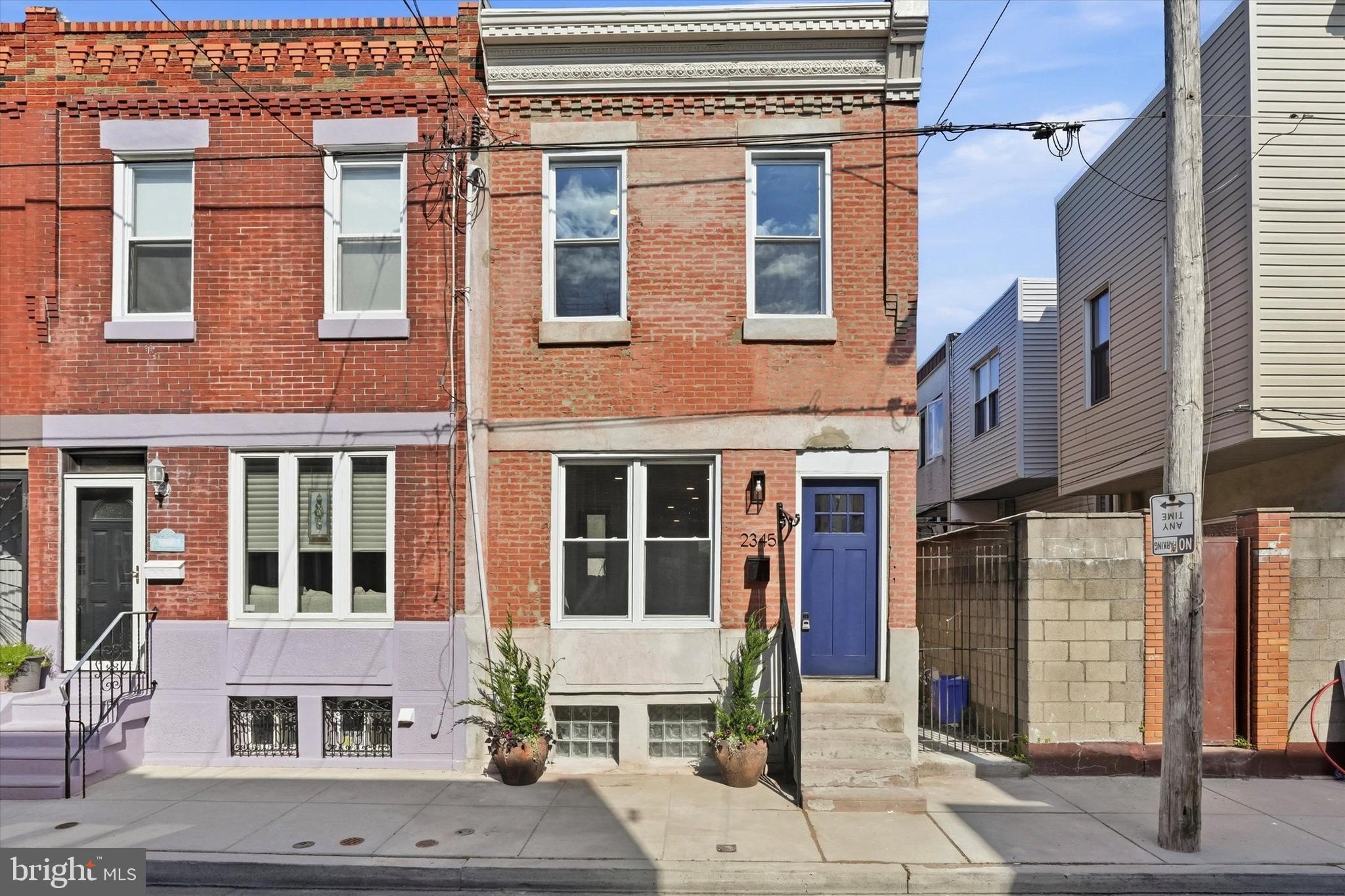 Located on a charming South Philadelphia block, 2345 S Bancroft Street is a beautifully renovated home that perfectly blends modern finishes with classic city character. This stunning 2 bedroom, 2 bath home features a striking brick façade, soaring ceilings, and abundant natural light throughout. Inside, you'll find gorgeous white oak hardwood flooring, a thoughtfully designed open layout, and a stylish kitchen complete with white quartz countertops, a beautiful tile backsplash, and sleek finishes. Each spacious bedroom offers its own private ensuite bathroom, creating the perfect setup for comfort and privacy. Additional highlights include convenient first-floor laundry, central air, a finished basement adding approximately 457 square feet of additional living space, and a private backyard area ideal for relaxing or entertaining.

Located in the heart of South Philadelphia, this home offers easy access to some of the city’s best restaurants, coffee shops, parks, and local hotspots. Enjoy being just minutes from East Passyunk Avenue, the Sports Complex, public transportation, and major highways, making commuting and enjoying everything Philadelphia has to offer incredibly convenient. This is city living at its finest!
