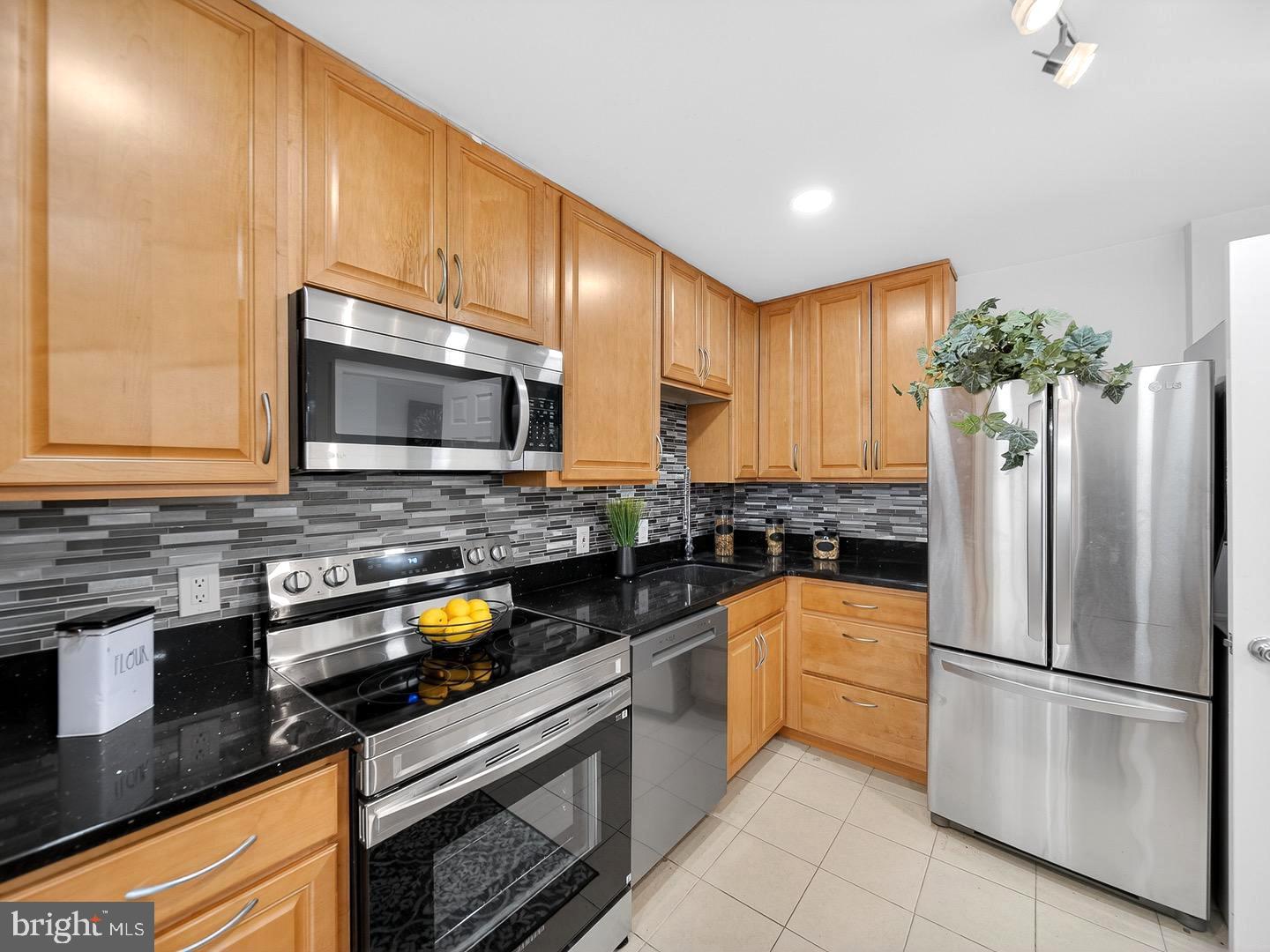 IMPRESSIVE TOP-TO-BOTTOM RENOVATION FOR THIS BEAUTIFUL 2 BEDROOM, 2 BATH CONDO (1,117 SQFT)! Do bot  miss out  on the Opportunity  to own  this beautifully updated , high-floor condo offering large bedrooms, Open floor plan with modern finishes, and stunning views of afternoon sunsets from a large  balcony through  floor-to-ceiling sliding glass doors. This  Modern condo offers a stylish 2-bedroom, 2-bath  unit  that  showcases a sleek, Upgraded & Modern  kitchen with top-of-the-line stainless steel appliances, soft-close cabinetry, Granite counter tops & title  backsplash and an in-unit washer and dryer for ultimate convenience . Recent updates include updated vanities and fixtures, recess lighting, upgraded floors and freshly painted. Enjoy open-concept living and dining areas filled with natural light, enhanced by dimmable recessed lighting and new  flooring that is perfect for entertaining or relaxing in style. Master Suite Retreat: Is a primary spacious  bedroom  that offers a custom walk-in closet with   a almost  brand new renovated in -suite  master bath . The second full-size bedroom is  abundant  with natural light and  costume shelving  with  access to a beautifully updated second full bathroom. Designed condo is designed with ample storage throughout,  functional  and upgraded  throughout . You don’t want to miss this move-in-ready dream condo, Please  schedule your showing!!