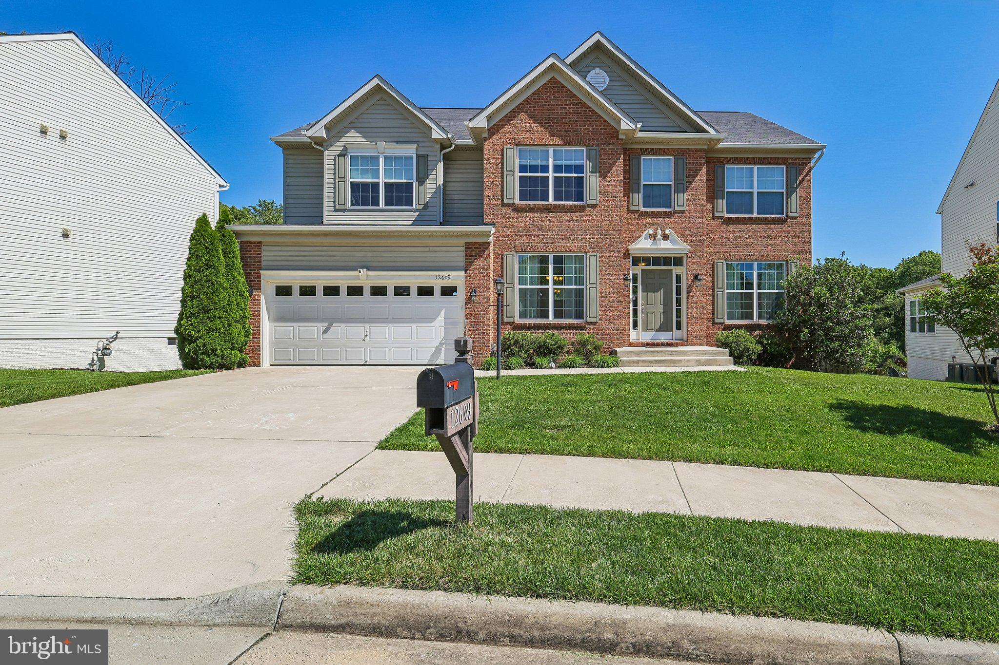 FABULOUS 6 -Bedroom Home in small enclave of homes! Welcome to 12609 Greenhouse View Way a stunning brick-front colonial nestled in the heart of the Clarke's Landing in Woodbridge, Virginia. Boasting over 4,800 square feet of living space, this 6-bedroom, 4-bathroom home is just perfect for those seeking space, style, and comfort. Step inside to find gleaming hardwood floors, awesome Chef's delight kitchen, with a bright and light breakfast room that floods the home with natural light, Two Story Family Room with gas fireplace and main level guest bedroom with full bath. The open-concept layout is ideal for both entertaining and everyday living, with generous room sizes and a seamless flow from one space to the next. Upstairs, the expansive primary suite features a luxurious en-suite bath and ample closet space and three additional good-sized bedrooms. The WALKOUT Lower level has a HUGE recreation room, exercise room and an additional bedroom and bath. Vacation at home with your own gorgeous inground pool. This home has it all.  Don’t miss your chance to own this home —schedule your private tour today!