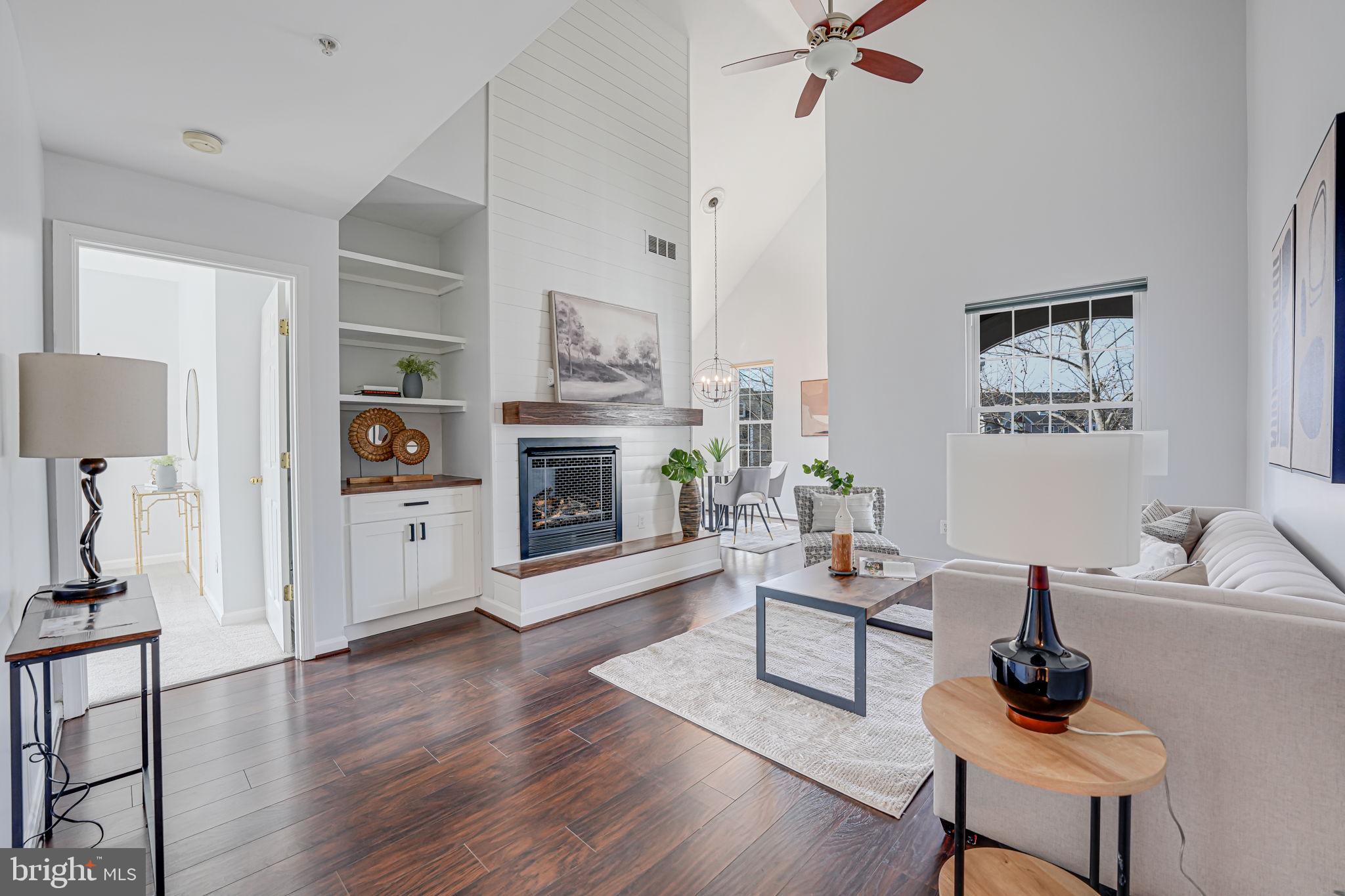 Renovated and spacious top floor unit in Riverbend at Cascades. Recent upgrades include: New carpet and paint (2025), new HVAC (2024), In-Line Water Conditioner Halo Ion (2023), new water heater (2023), renovated master bathroom (2021), renovated gas fireplace (2021), and renovated kitchen (2019). The unit features two bedrooms and two full bathrooms, huge upper level loft, gas fireplace with wood mantel and shiplap extending to the ceiling, beautiful kitchen with granite countertops and stainless appliances, and a balcony with a great view. HOA fees include parking (2 spots), water, sewer, trash collection (onsite compactor), common area maintenance (including pool and gym), parking lot/sidewalk snow removal, and building exterior maintenance (including balconies). Amenities include access to multiple pools (one in Riverbend, multiple in Cascades), party room (available for rent in the Riverbend community building), tennis/pickleball courts (managed by Cascades HOA), playgrounds, gyms (one in Riverbend and additional options through Cascades HOA), and boat launch access in Algonkian Park.