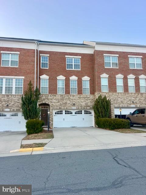 Welcome to this beautifully maintained 4‑bedroom, 3.5‑bath townhome in the heart of Brambleton, one of Loudoun County’s most sought‑after communities. Nestled on a premium cul-de-sac lot backing to wooded common area and parkland for ultimate privacy. Offering an ideal blend of comfort, space, and convenience, this move‑in ready home delivers the perfect layout for both formal entertaining and relaxed everyday living. **** Step inside to the entry level featuring a light filled foyer, spacious 2 car garage and a generously sized recreation room—a flexible space perfect for play, work, or movie nights. This level offers natural light in the spacious rec room, a legal bedroom, a full bathroom, and direct access to the 2‑car garage and fully fenced rear yard with a lovely paver patio. **** Walk up to a bright, open floor plan featuring a large living room with rich hardwood floors and crown molding, an open concept dining area leading into the kitchen featuring a large center island, granite countertops, stainless steel appliances, and a welcoming bonus sunny bump‑out family room with gas fireplace and wooded views overlooking the fully fenced, serene backyard. Enjoy morning coffee or evening gatherings on the large composite deck, with wooded privacy and low‑maintenance landscaping. A powder room complements the main level **** Upstairs, the beautiful hardwoods add warmth and continuity to the home as they are carried into the hall and all three bedrooms, including an expansive owner’s suite featuring a custom bump-out perfect for a home office or additional sitting room, a wall-in closet with custom shelving and a spa‑inspired bathroom with a dual sink vanity, a separate soaking tub and shower. Two additional bedrooms, a full hall bath with dual sink vanity, and a conveniently located laundry closet with front loading machines complete the upper level. **** Recent owner updates include new toilets, new faucets, a new kitchen sink and faucet, a new screen door, and care throughout. This home is neutral, inviting, and ready for its next chapter. **** Live the Brambleton lifestyle with unmatched amenities: pools, parks, trails, tennis courts, basketball courts, a community center, fitness options, shopping, restaurants, and even a movie theater—all just moments away. Additional bonus parking is directly opposite the home along with access to the walking/jogging path and a cul-de-sac location make this the perfect choice for your next home! Owner‑occupied; a rent‑back is kindly requested.