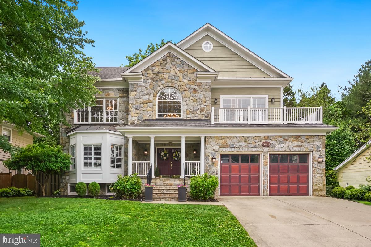 Welcome home to this exceptional 5-bedroom, 4.5-bathroom Craftsman, ideally situated in the highly sought-after Bradmoor neighborhood. Spanning more than 6,000 square feet across four beautifully appointed levels, this residence pairs classic architectural character with thoughtfully curated modern updates. A dramatic two-story foyer, crowned by a graceful staircase, sets an elegant tone from the moment you step inside.

The main level is designed for both everyday living and gracious entertaining, with a formal living room, a formal dining room, and a fireplace-warmed family room that flows seamlessly into a gourmet kitchen appointed with an oversized island, premium appliances, and a light-filled breakfast area. A dedicated office on this level offers a refined space for work.

The third level is home to four generously sized bedrooms and three full bathrooms, complemented by a laundry room and a striking overlook to the foyer below. The primary suite is a private sanctuary, featuring three walk-in closets, a wraparound private balcony, and a spa-inspired bath with a soaking tub, glass-enclosed shower, and dual vanities.

The fourth level offers a private office, a fully equipped home gym (which could easily serve as a 6th bedroom), a sauna, and abundant storage — an elevated retreat for work and wellness alike. The finished lower level extends the home's living space with a second family room and fireplace, a wet bar, an additional bedroom and full bathroom, a den, and a versatile bonus room ideal for a playroom, home classroom, or creative studio.

Ideally situated, this home places you moments from downtown Bethesda's premier dining, boutique shopping, and entertainment, as well as NIH, Suburban Hospital, Montgomery Mall, and the Capital Crescent Trail. Effortless access to I-270 and I-495, along with a direct commute into DC via Wisconsin Avenue or Old Georgetown Road, adds further convenience — all within the coveted Walt Whitman school cluster. This is more than a home — it's a rare opportunity to live exceptionally well in the heart of Bethesda.