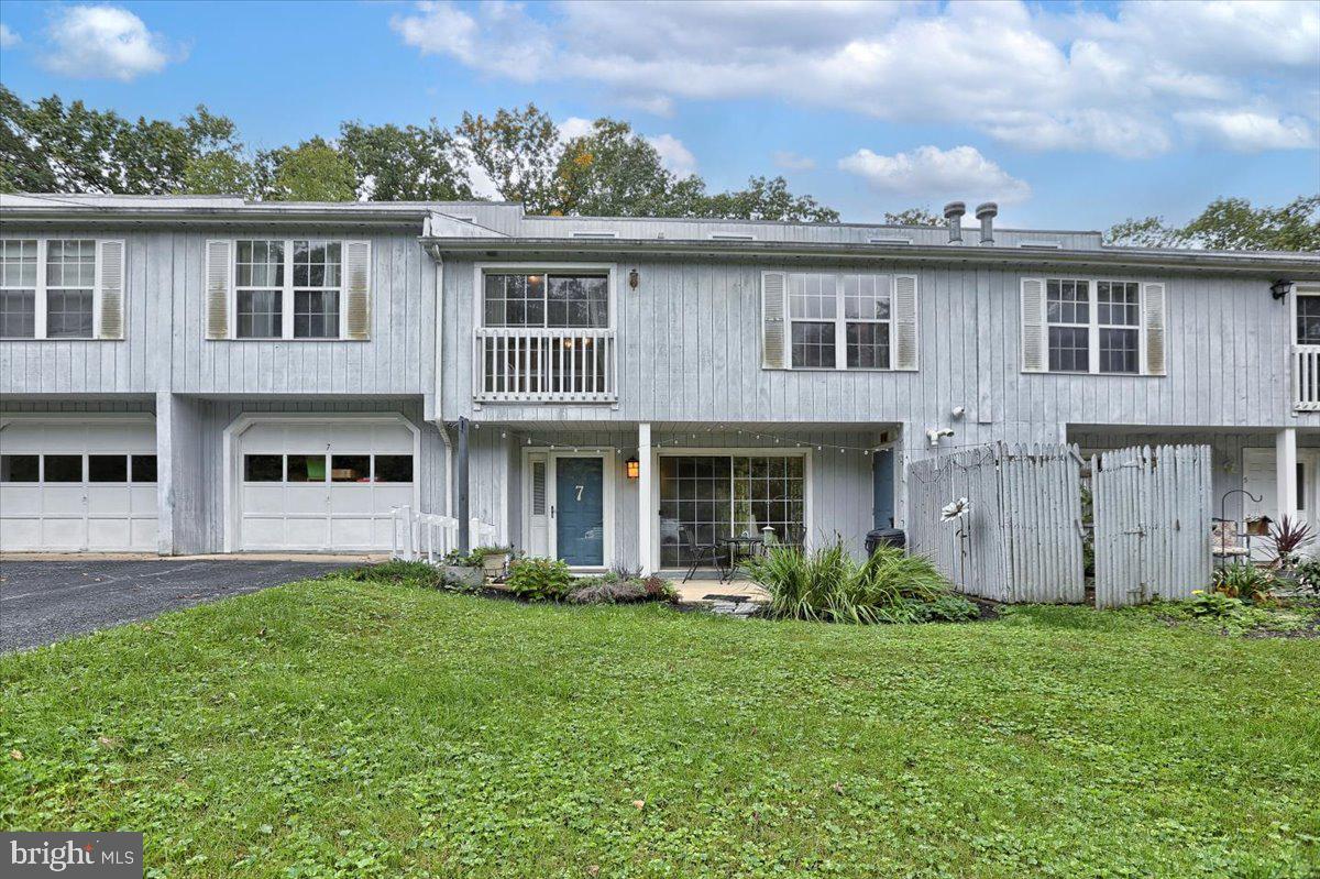 Get ready to be pleasantly surprised by almost 2000 square feet of living space in this well maintained home in Warrington Ways Condominiums!  This condo features 3 bedrooms and 3 and a half bathrooms - Including two spacious master suites both with walk in closets and full bathrooms!  Stay cozy in front of the gas fireplace in the living room which opens to the dining room and galley kitchen.  On the second level, a laundry room and full bath is conveniently located between the two master suites, as well as a unique open loft space, with plenty of natural light making it perfect for a reading nook or artist's loft.  On the third level you will find the 3rd bedroom and open loft, overlooking the second and first floors.  This is a truly unique space with lots of amazing potential! Enjoy ease of ownership with a condo fee that includes your water, sewer, trash, snow removal and lawn maintenance. This home is located minutes from Ski Roundtop and Pinchot Park, and offers an easy commute to York and Harrisburg.  Schedule your showing today!