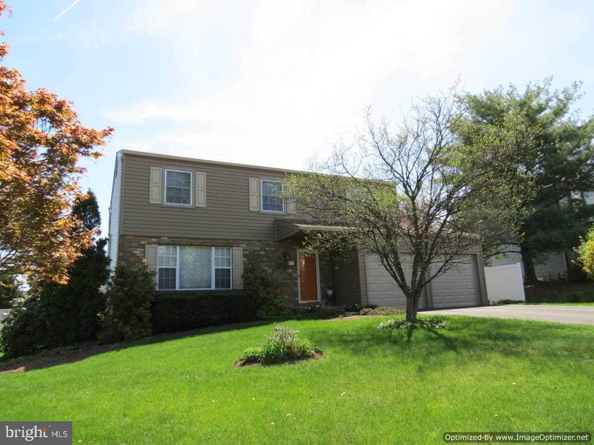 Immaculate 4 bedroom, 2.5 bath home on quiet cul-de-sac is ready for you! Home offers 1.947 SF of living space w/large LR that leads into formal DR, Kit is complete w/an island & addl cabinet storage space. FR w/wood FP & a slider to the screened porch complete w/Ceiling fan & skylights. MBR has W/I closet, full bath & W/D hook-up for 2fl lau. Full BSMT & 2 CAR gar. MAKE THIS HOME YOURS TODAY!  New Carpet, fresh paint thruout!